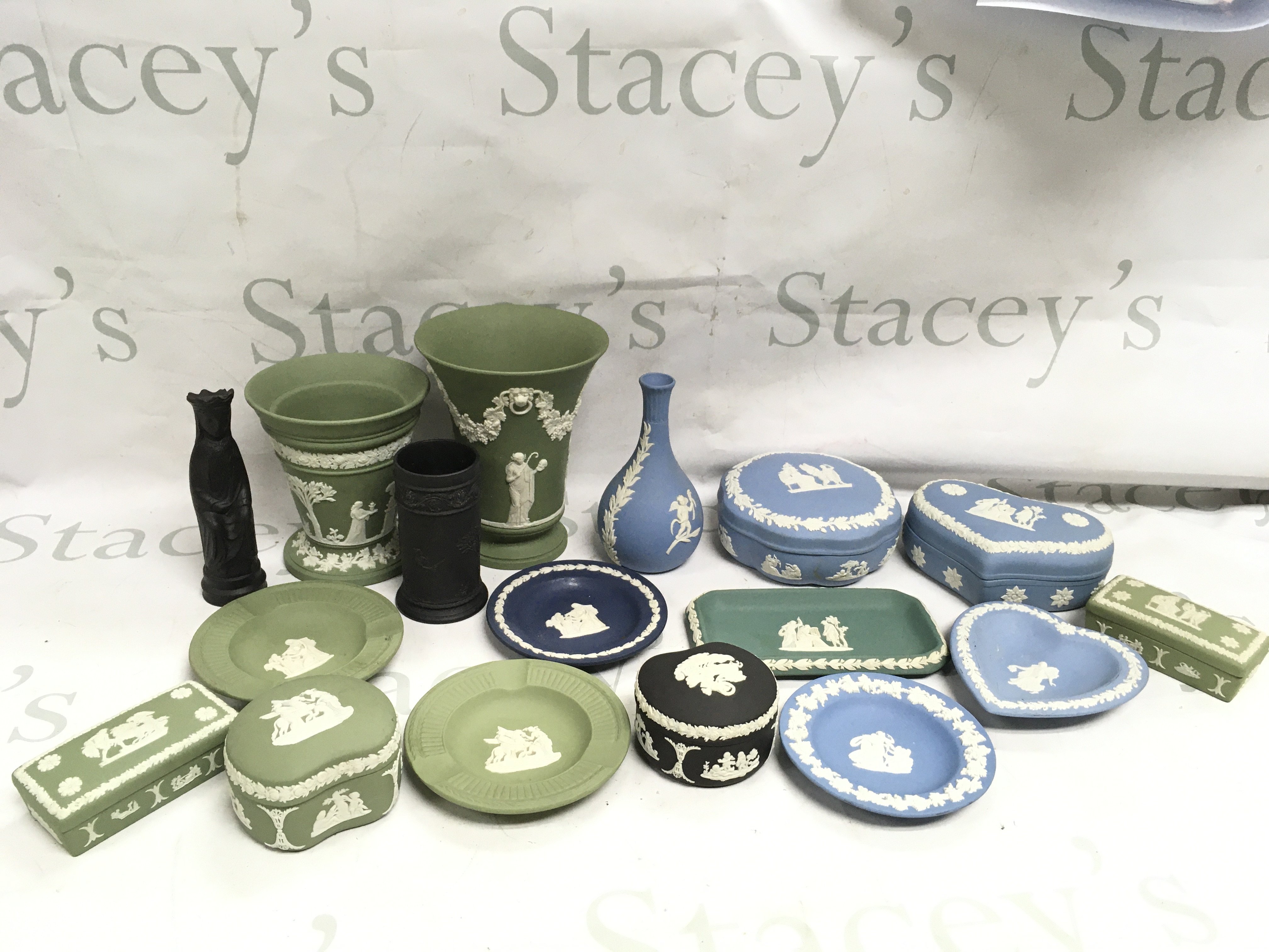 A collection of Wedgewood in various colours including Vases, dishes, trinket boxes etc. this lot cannot be posted