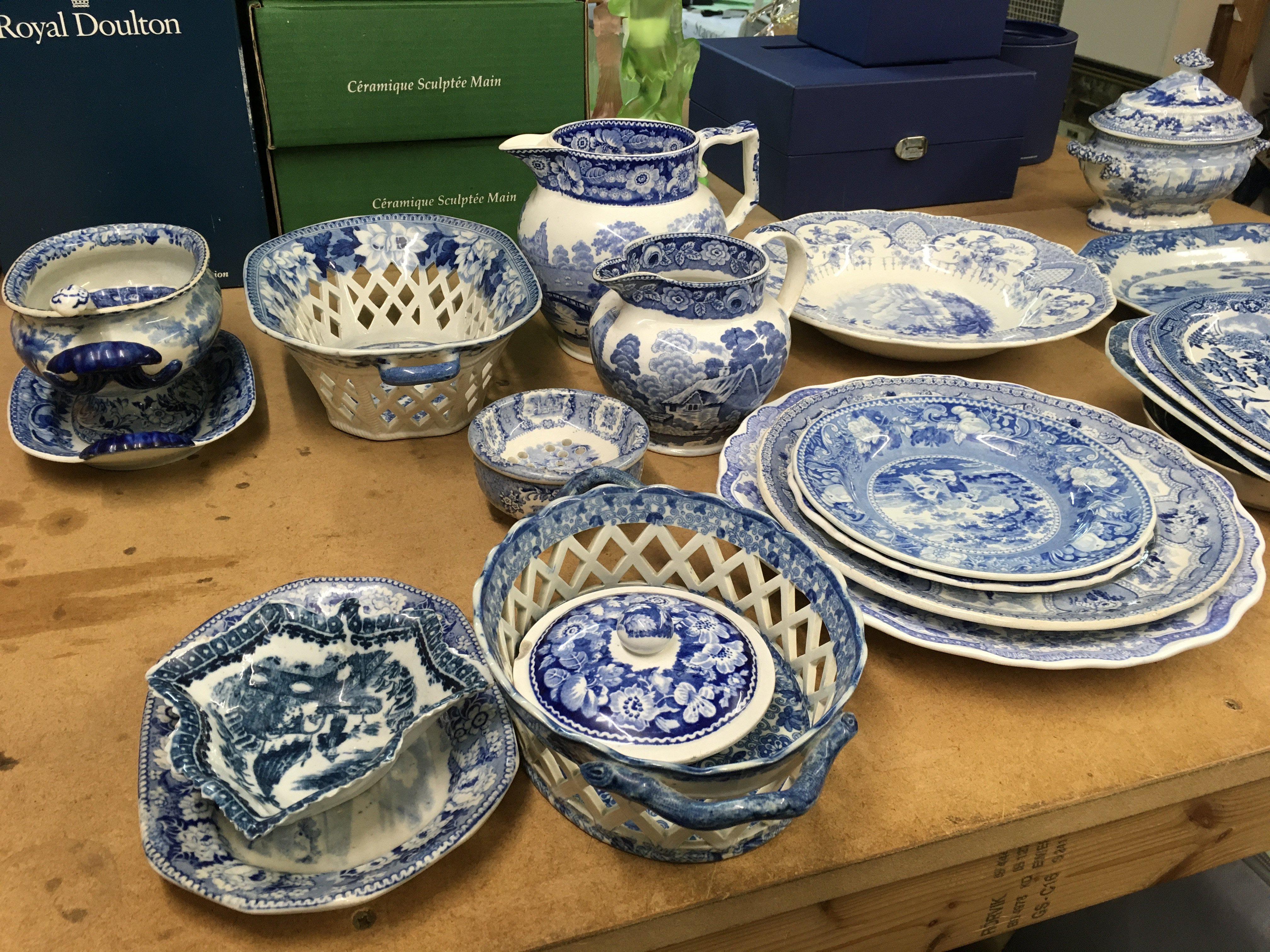 A Collection of 19th Century blue and white transfer ware including jugs dishes plates pickle dish .