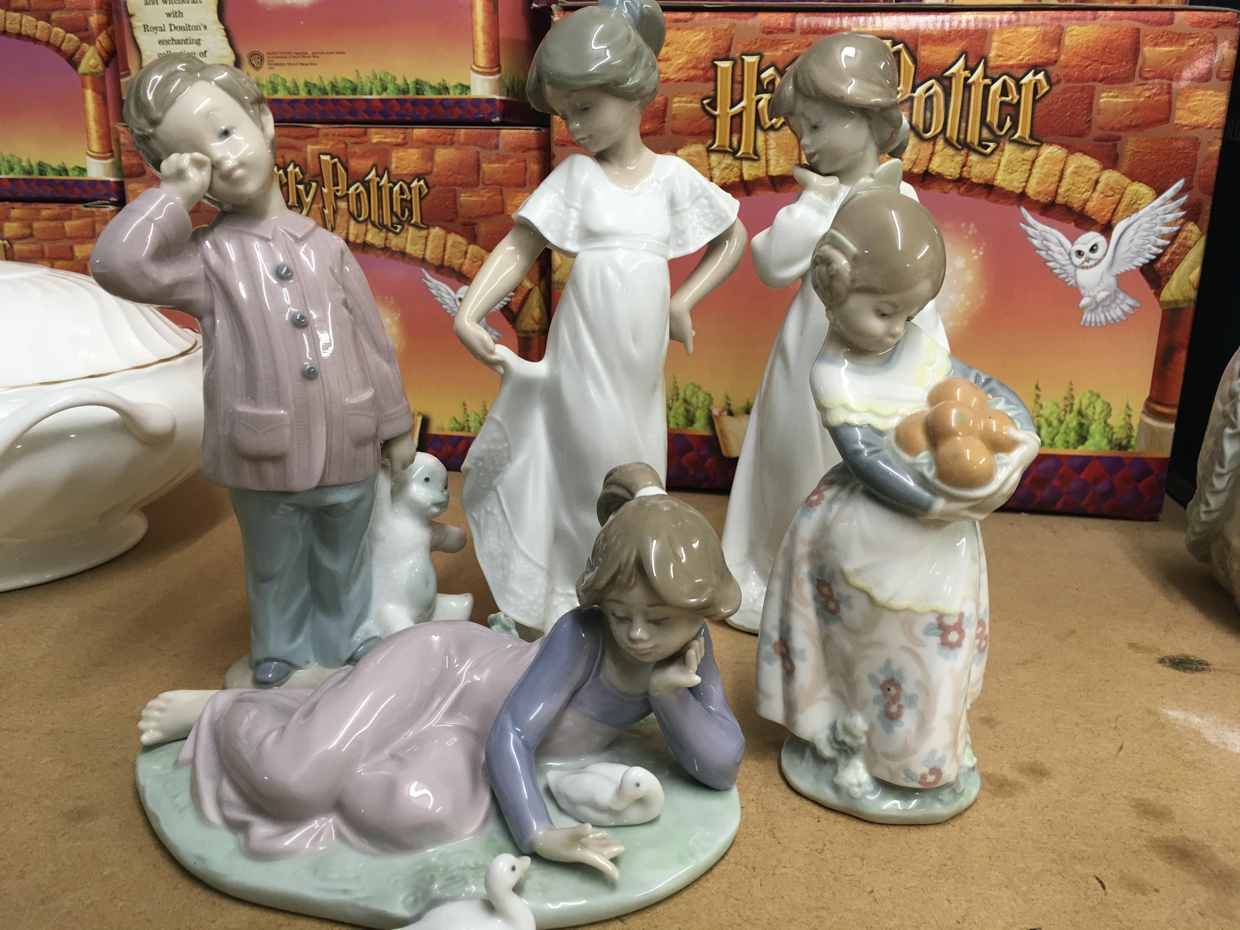 A Collection of five figures Lladro and Nao