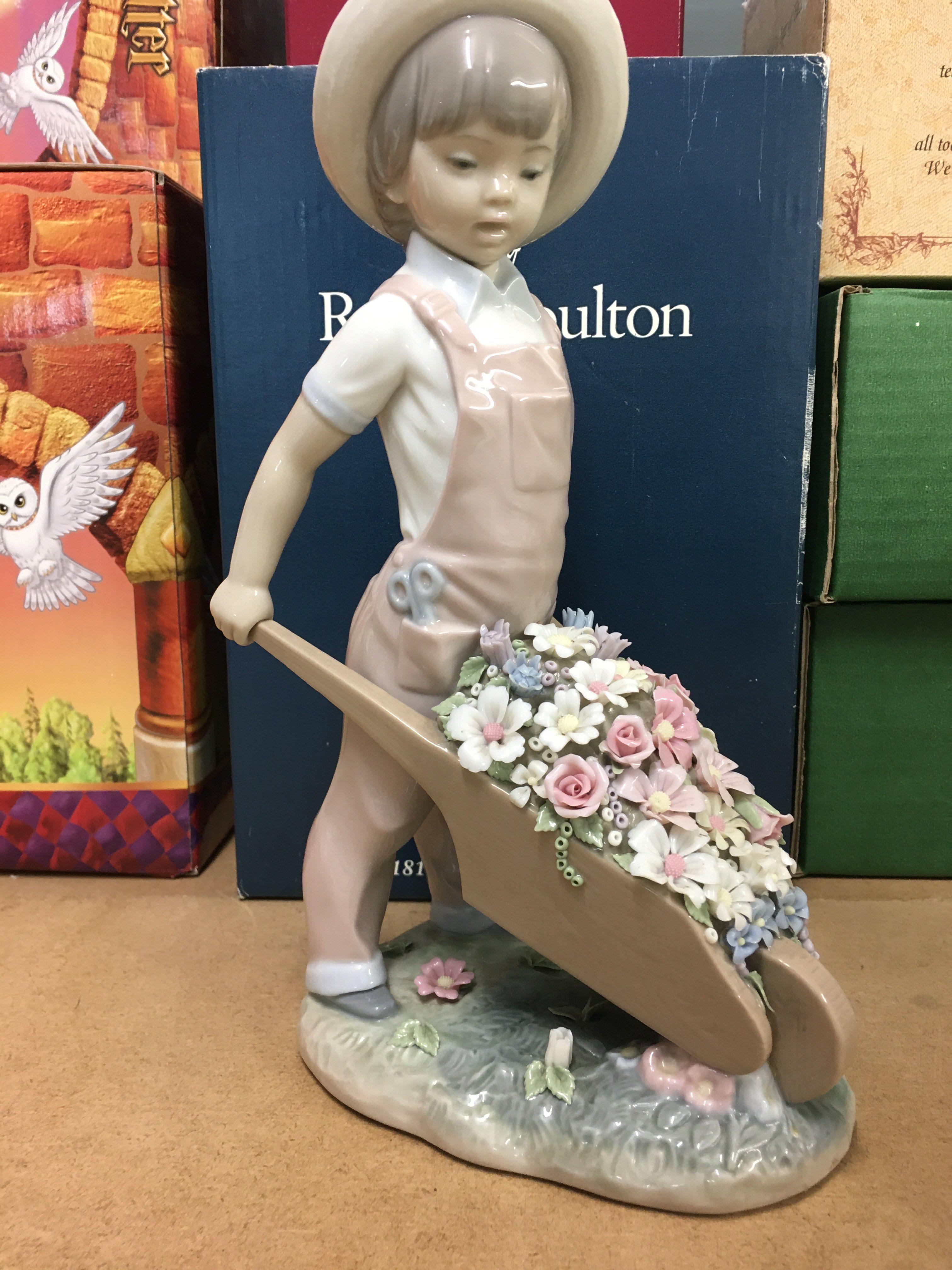 A Lladro figure the little Gardner 24 cm .