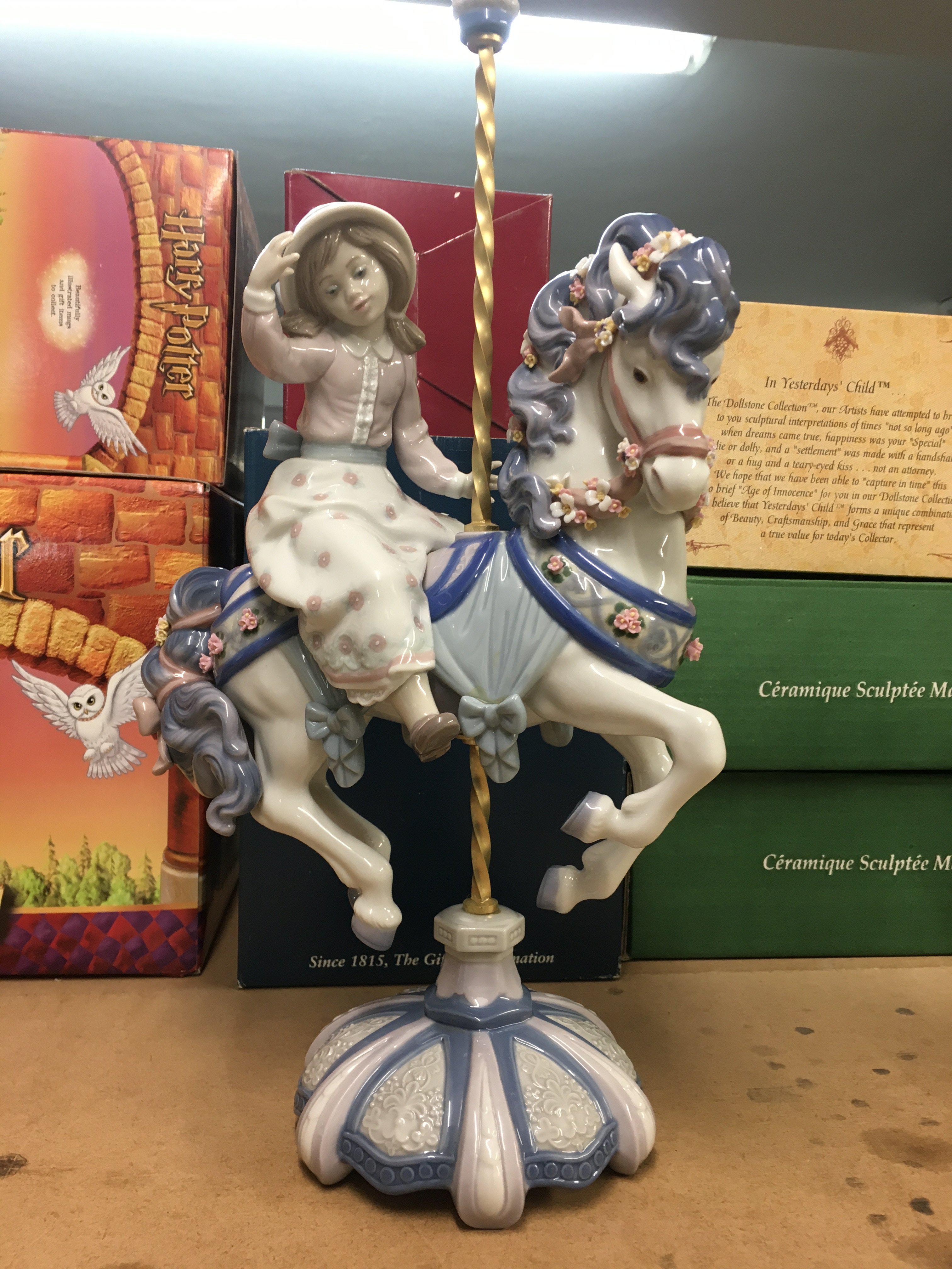 A Lladro figure carousel charm 42 cm