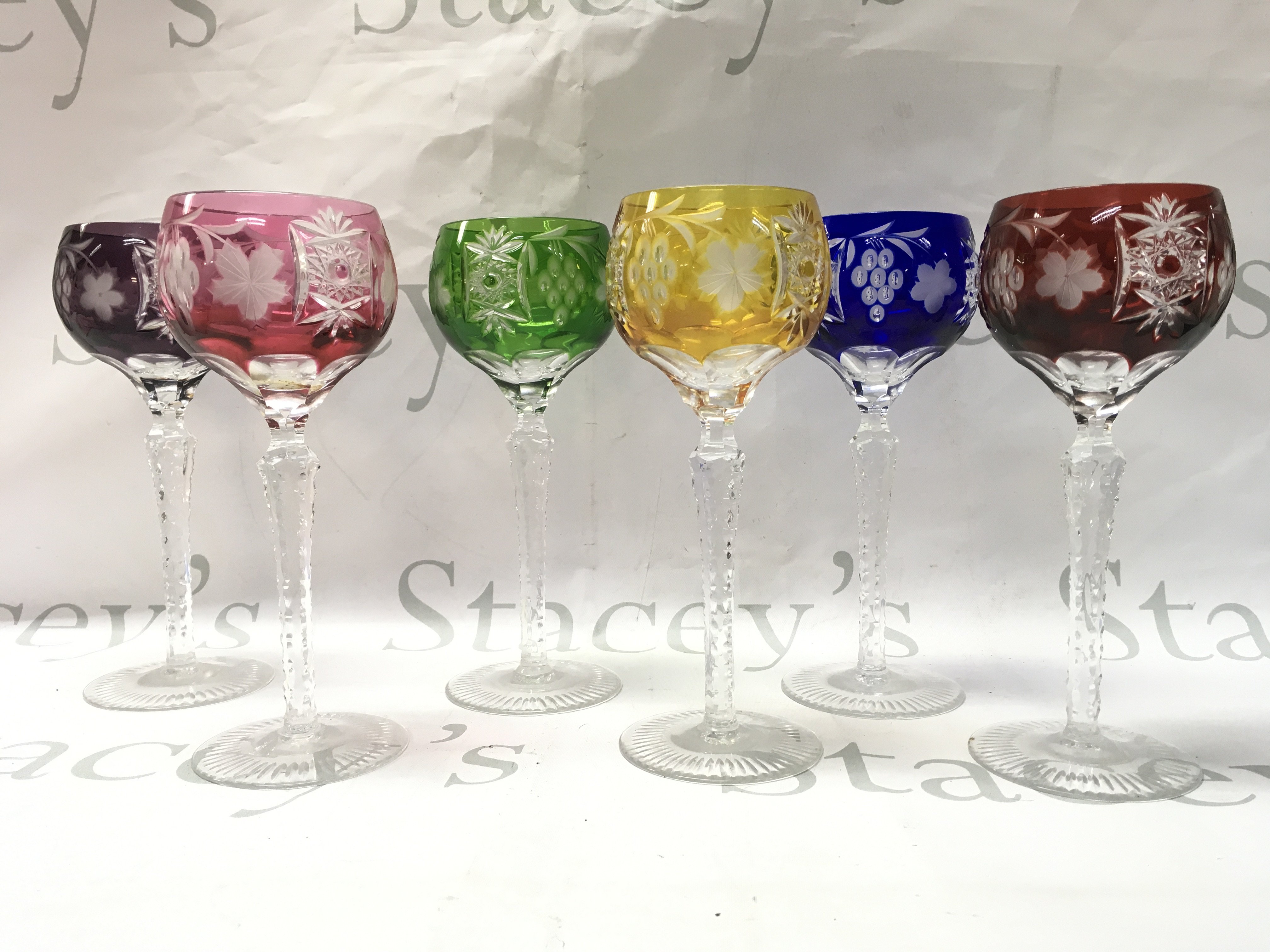 Six multi coloured Hock glasses approximately 22cm tall. This lot cannot be posted