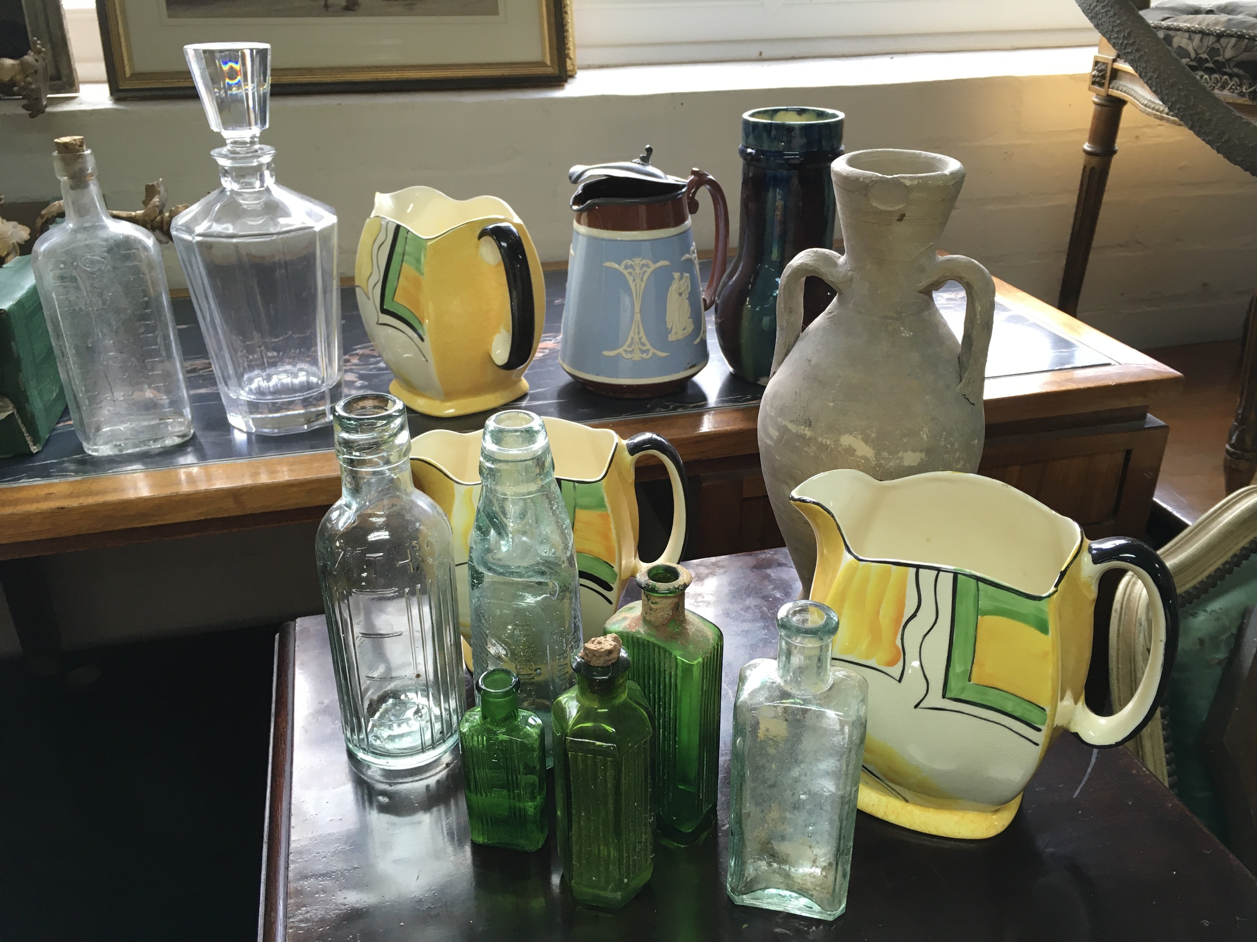 A Collection of ceramics including glass bottles,