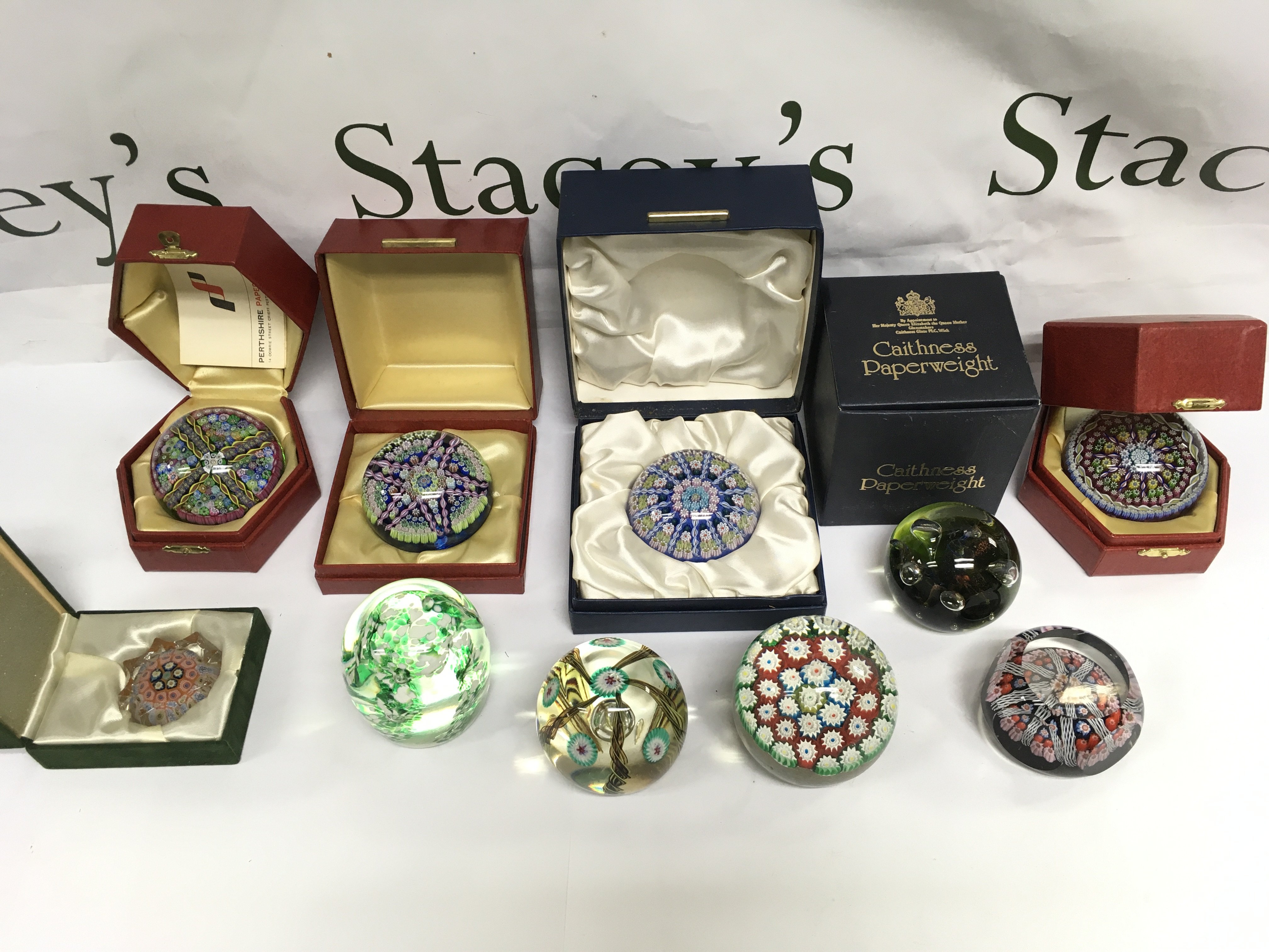 Ten paperweights including four boxed examples including Caithness and Perthshire paperweights. Shipping category D.
