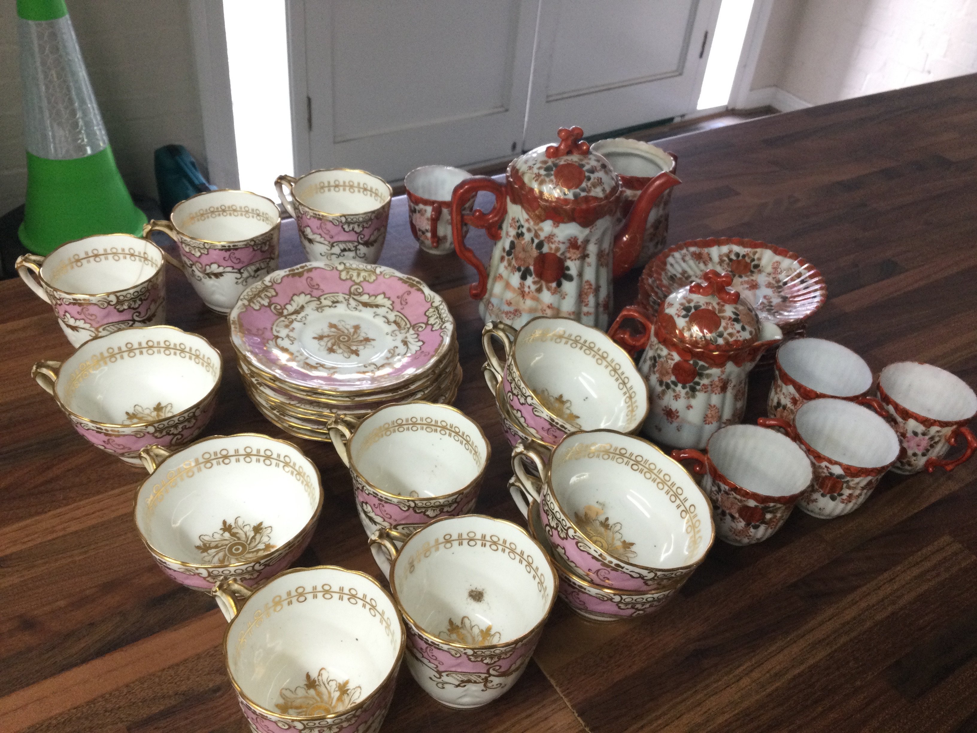 A Victorian pink and gilted part tea set , six saucers, cups of two sizes , Japanese Kutani part set
