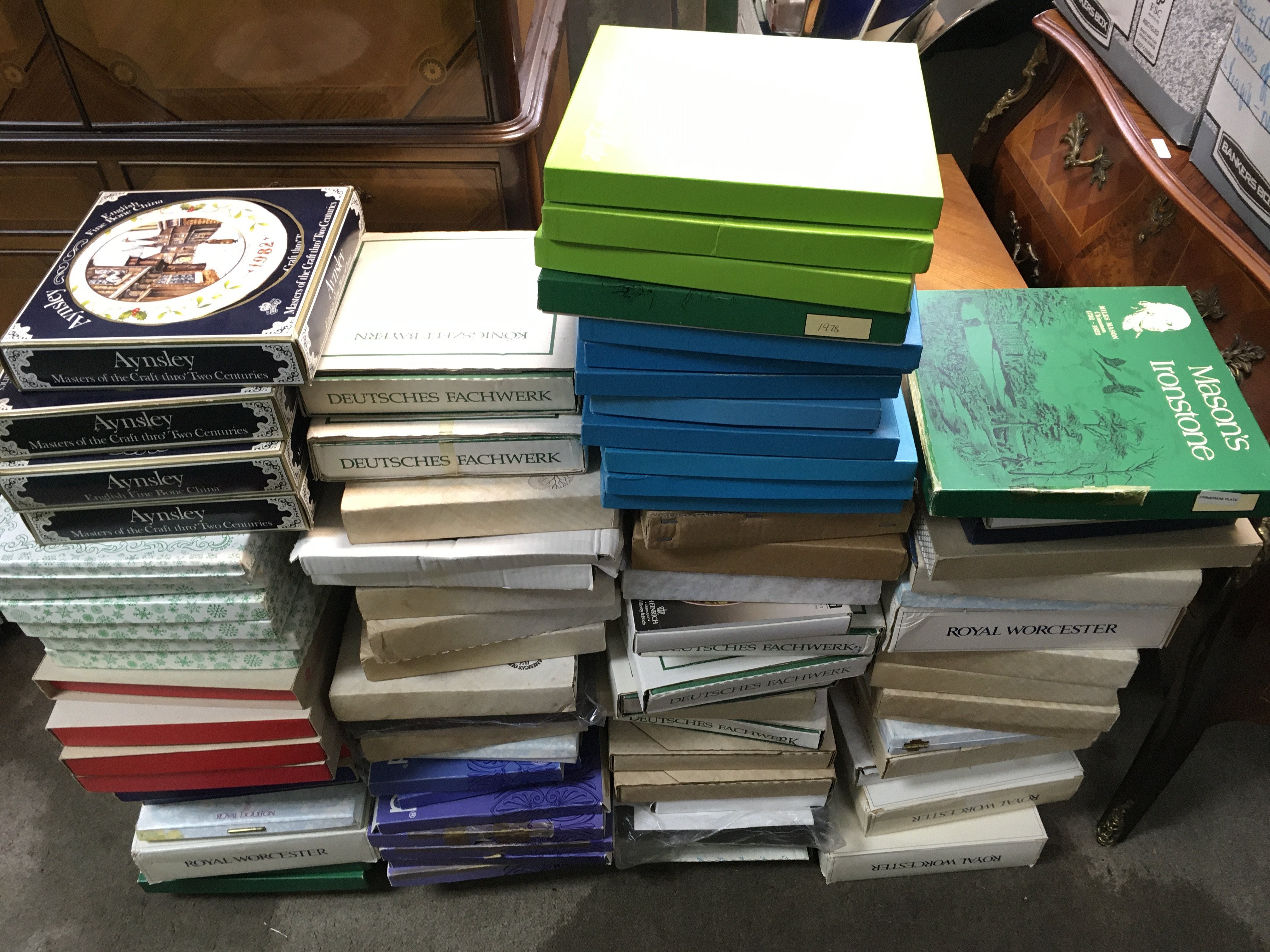 A large collection of Boxed collectors plates including Aynsley, Worcester, Wedgwood etc. this lot cannot be posted