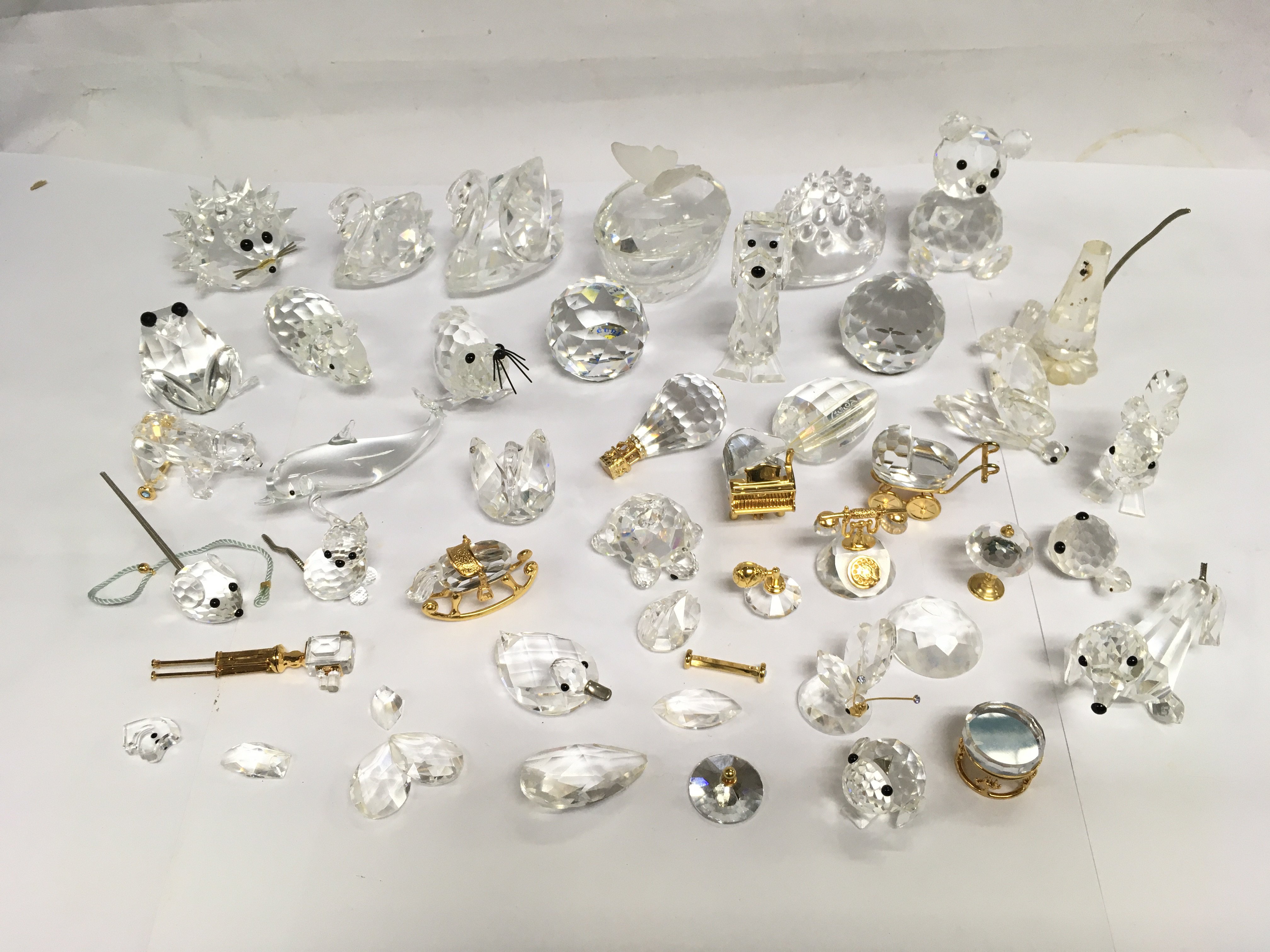 A collection of Swarovski ornaments. Shipping category D.