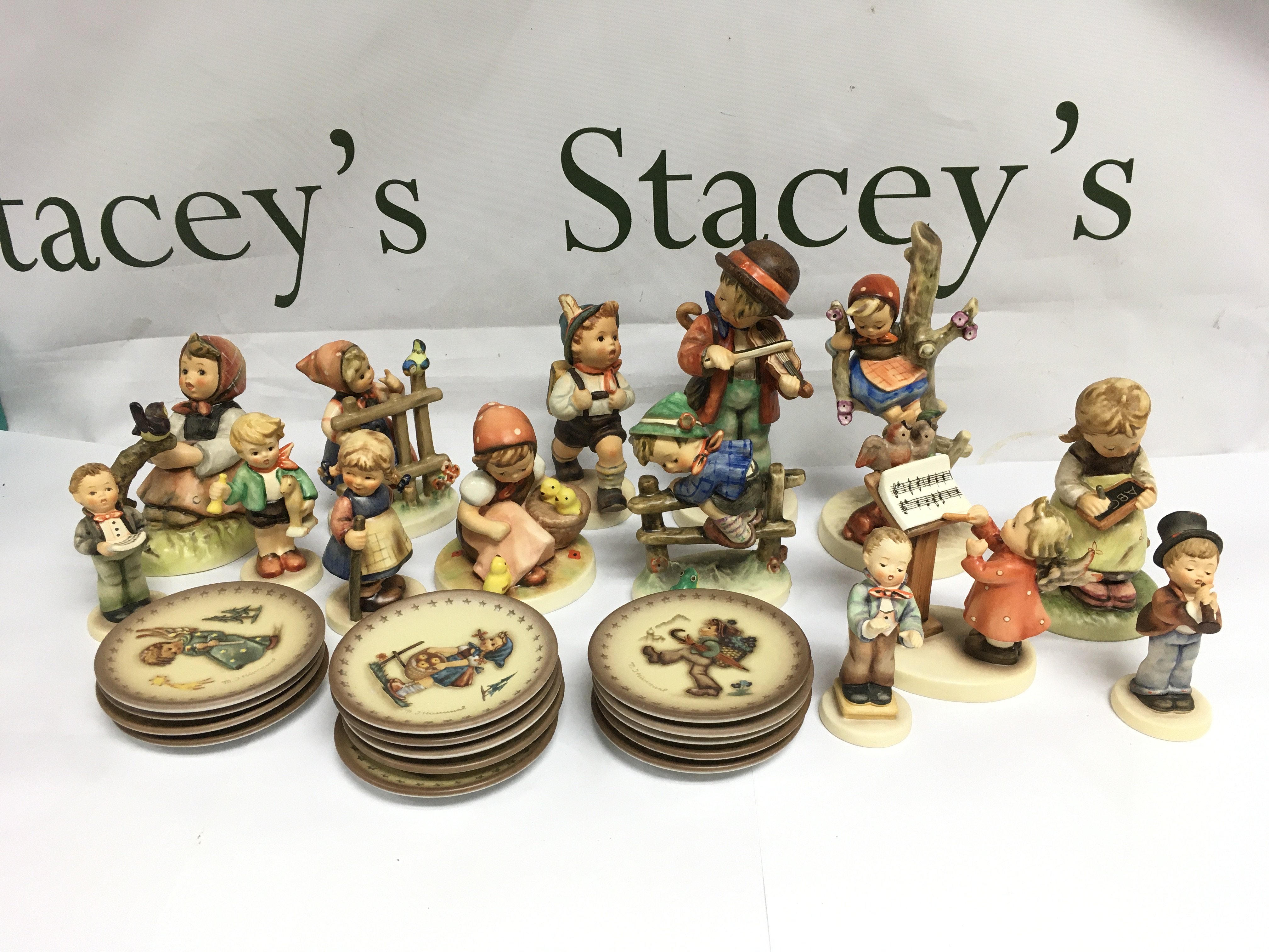 A collection of Goebel Hummel figures and dishes. Shipping category D.