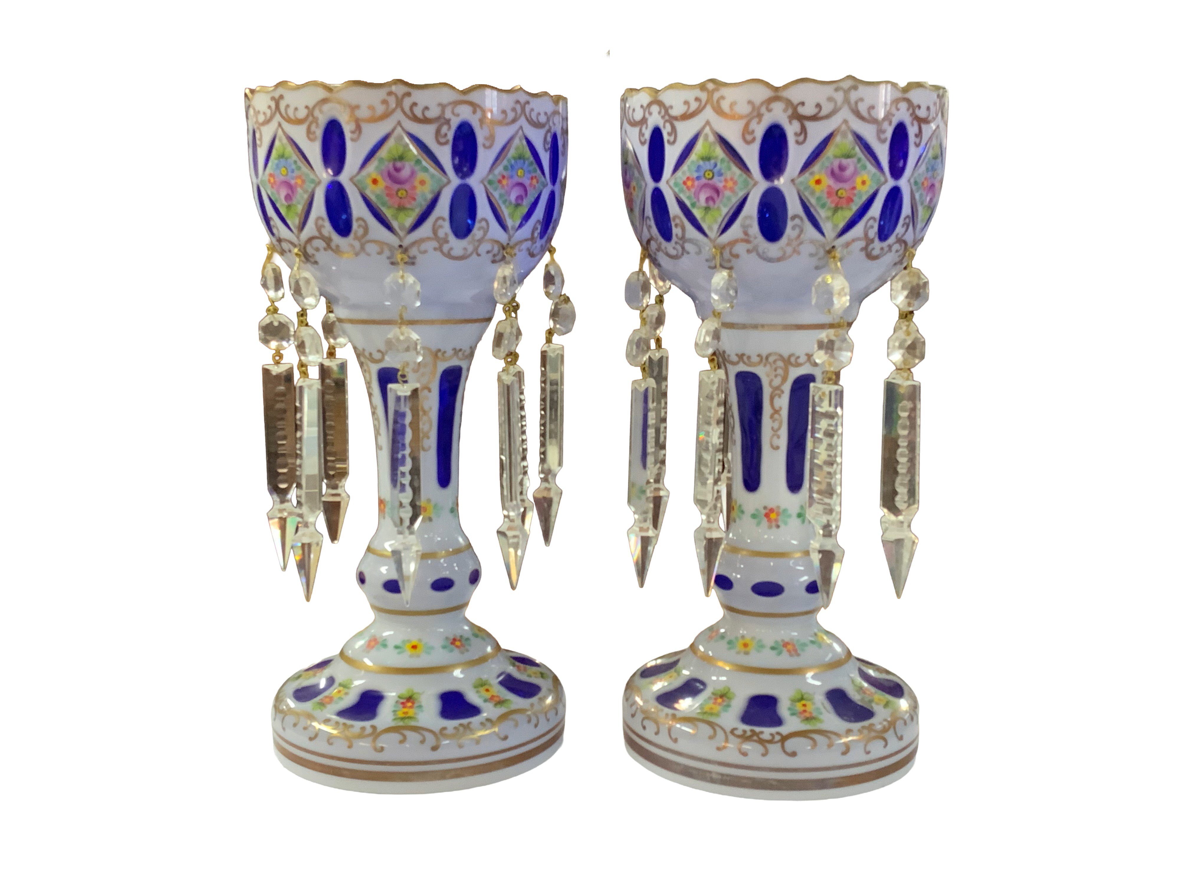 A pair of Bohemian overlay glass lustres. H.30.5cm