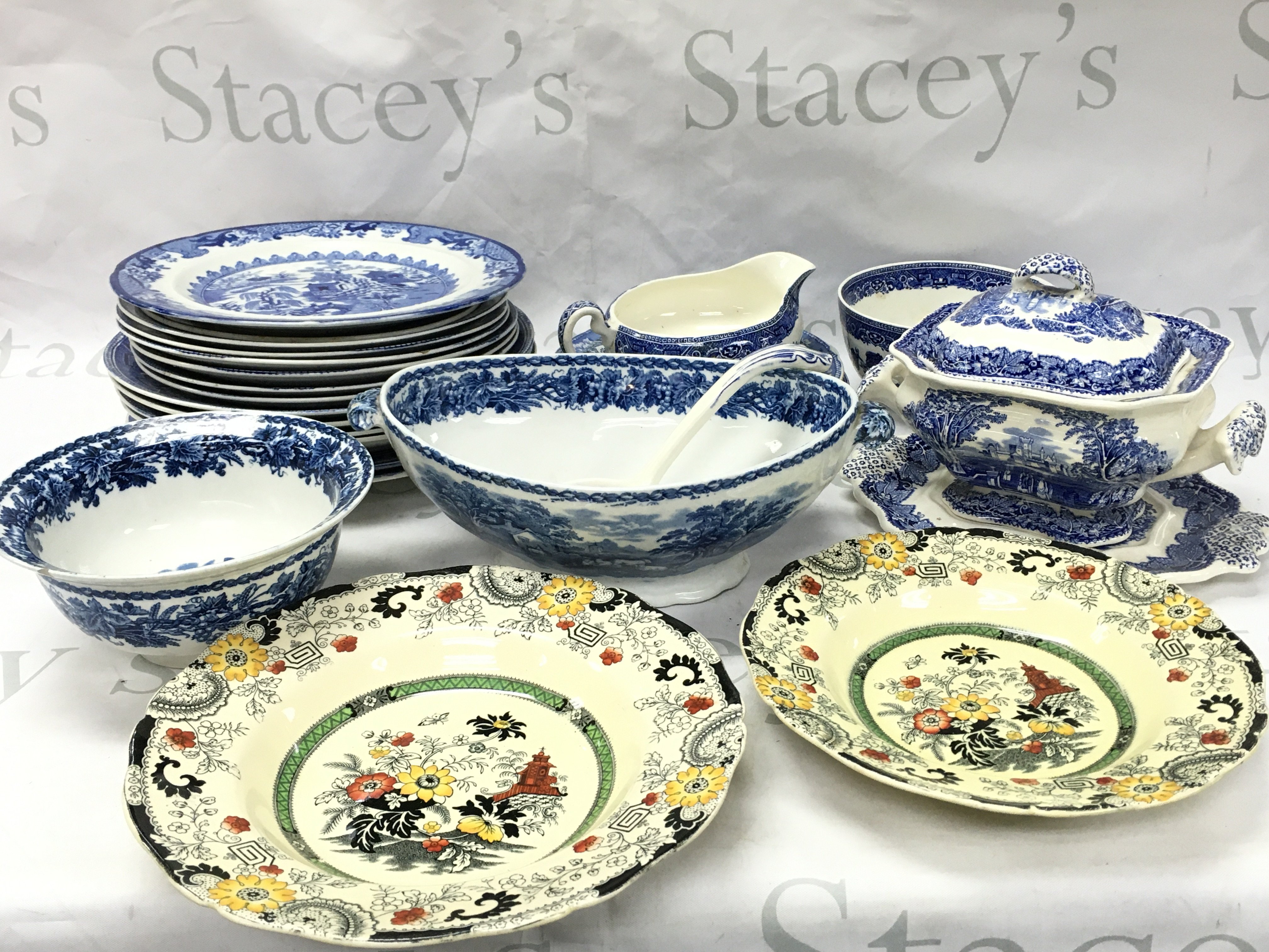 A Collection of blue and white ceramics including plates, bowls by Booths, Masons, Old Willow etc Coalport Kings ware canton dishes. This lot cannot be posted