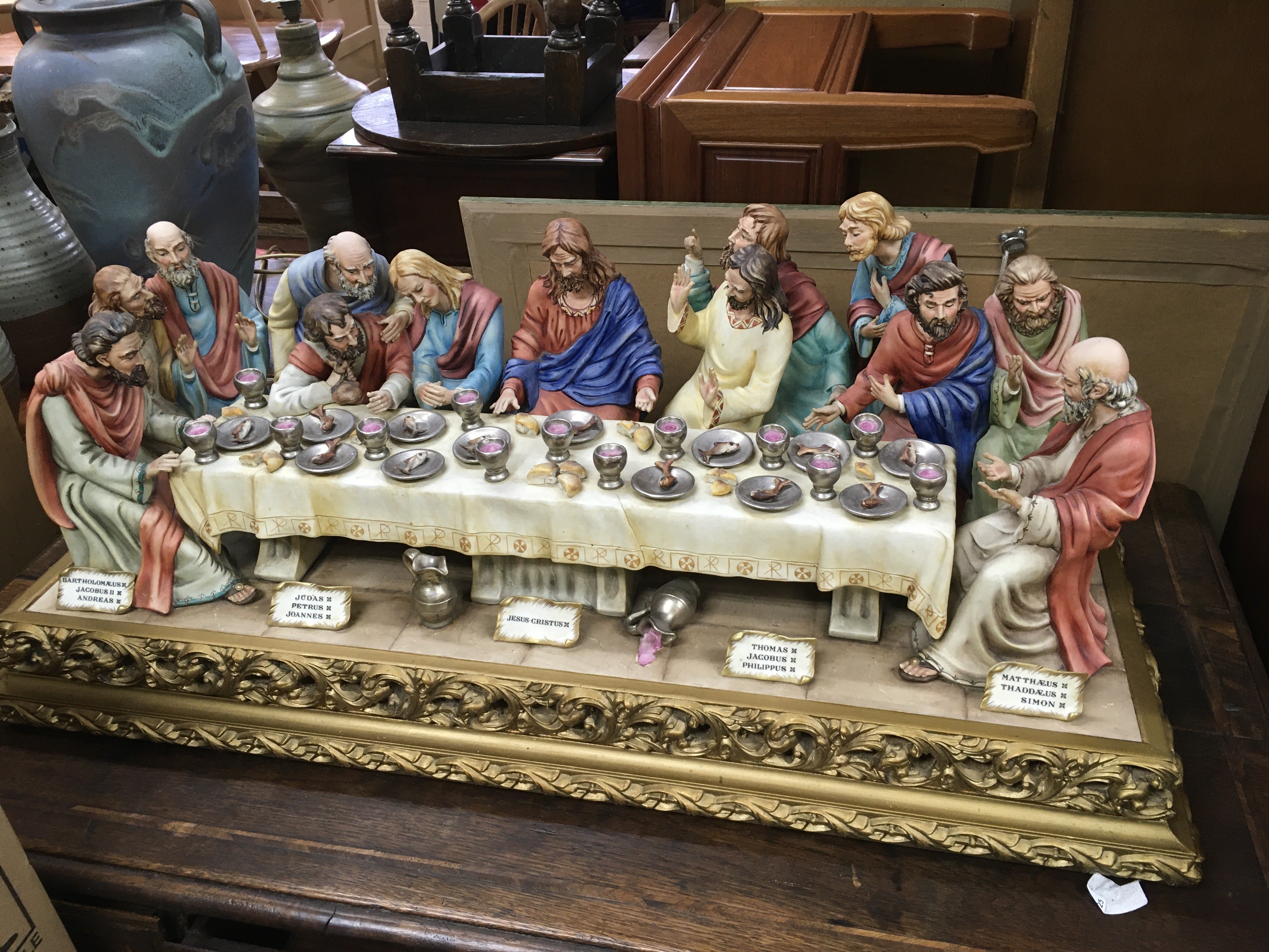 A large Capodimonte figural group of the last supper, approx length 85cm. Shipping category D.