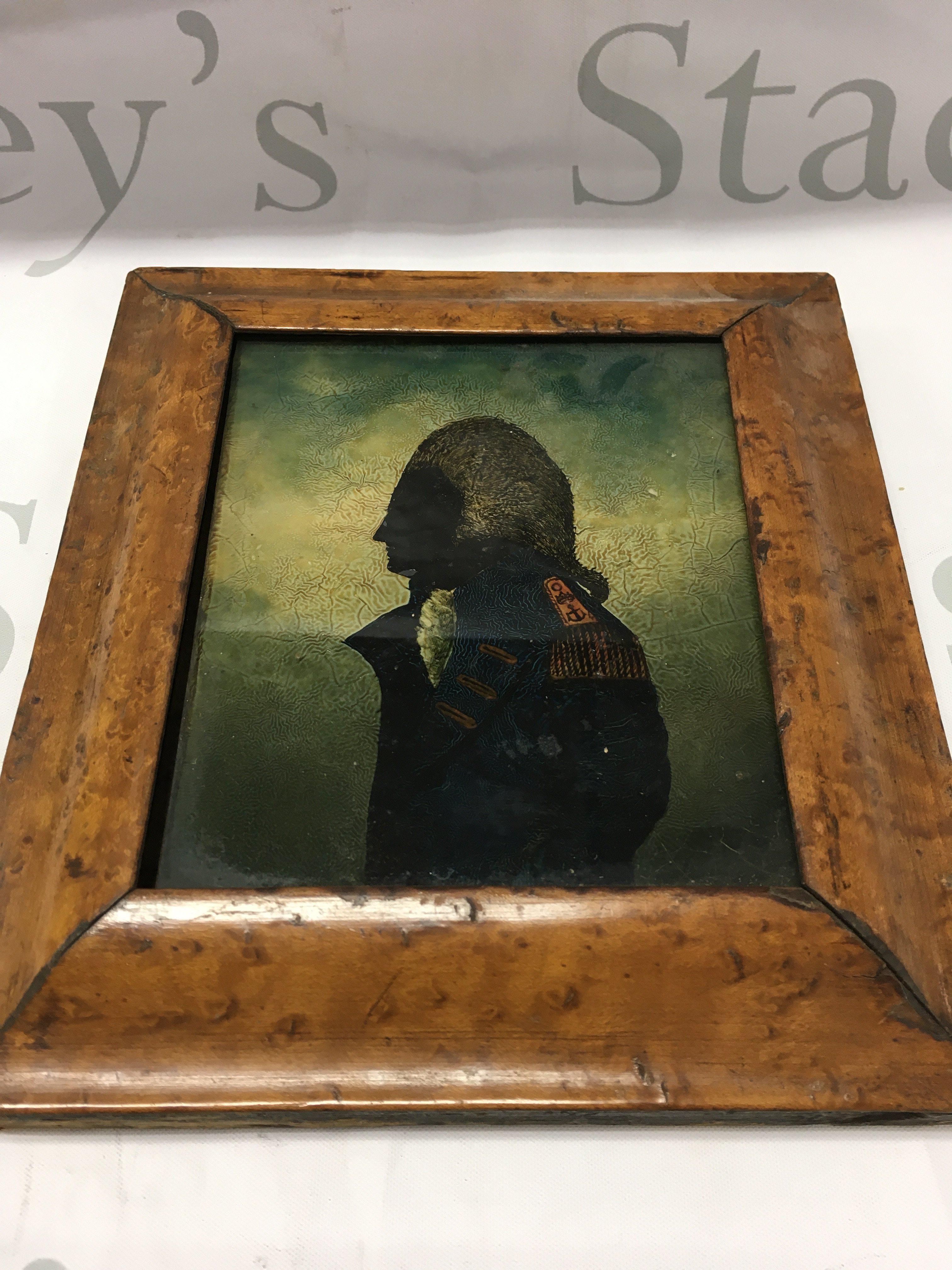 A Captain Arnold, Portsmouth, walnut framed miniature. Approx frame size 19cm x 21cm.
