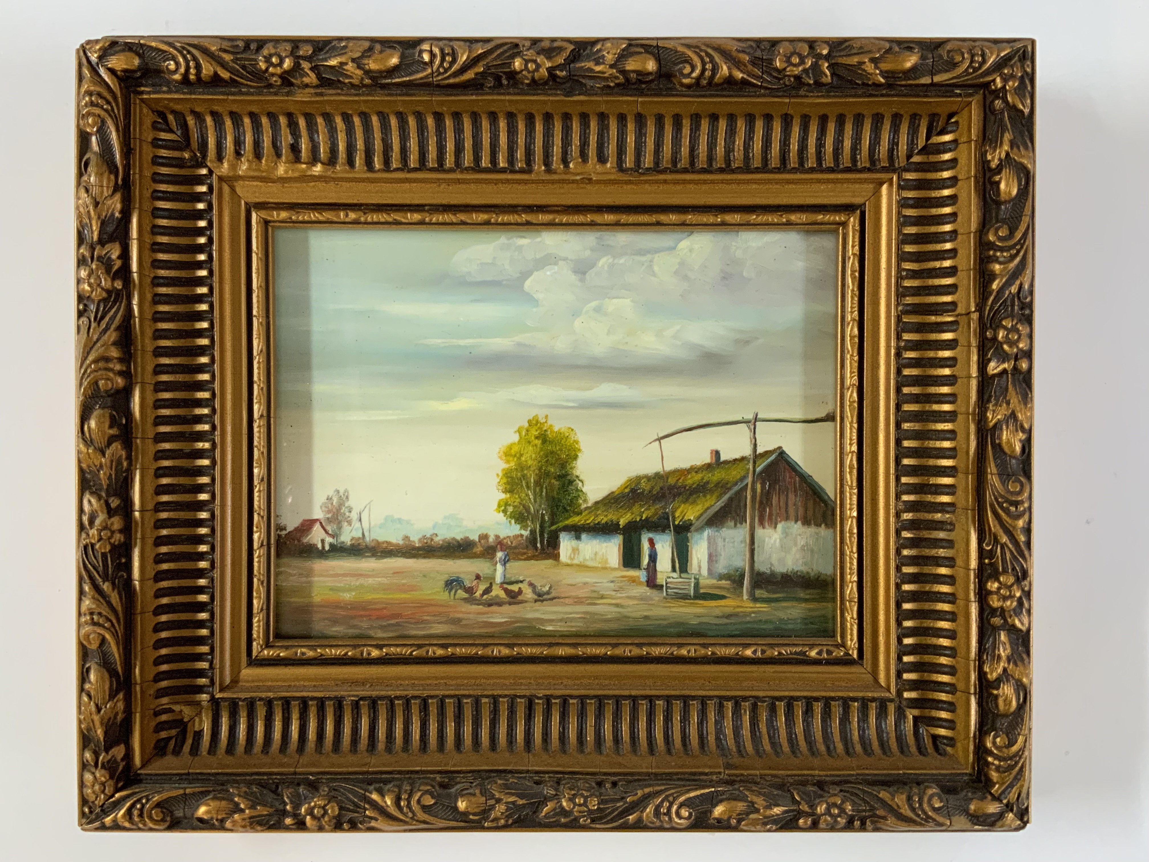 A small gilt framed oil on board painting, signed to reverse. 29.5cm x 24.5cm