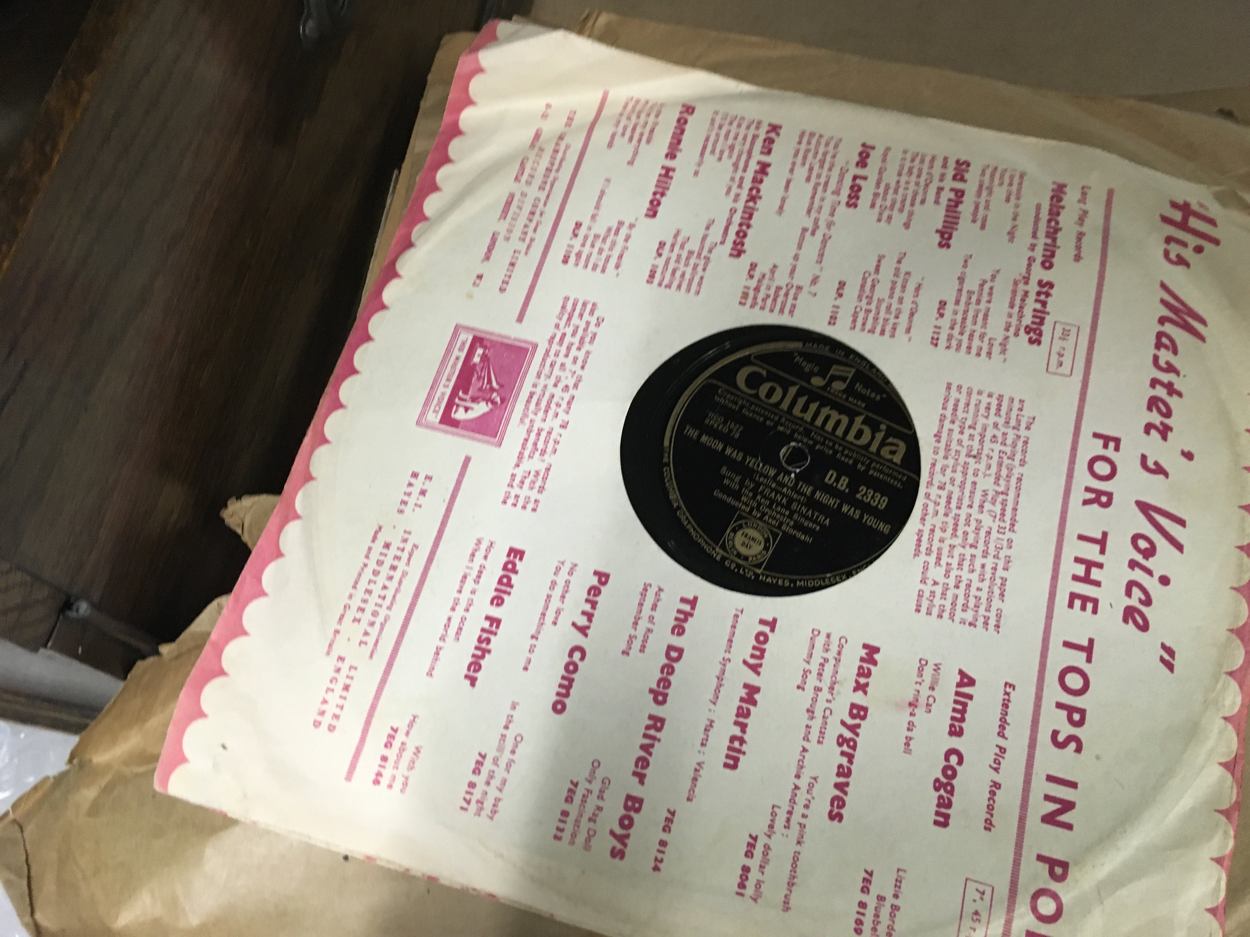 A oak table top gramophone with records . NO RESERVE