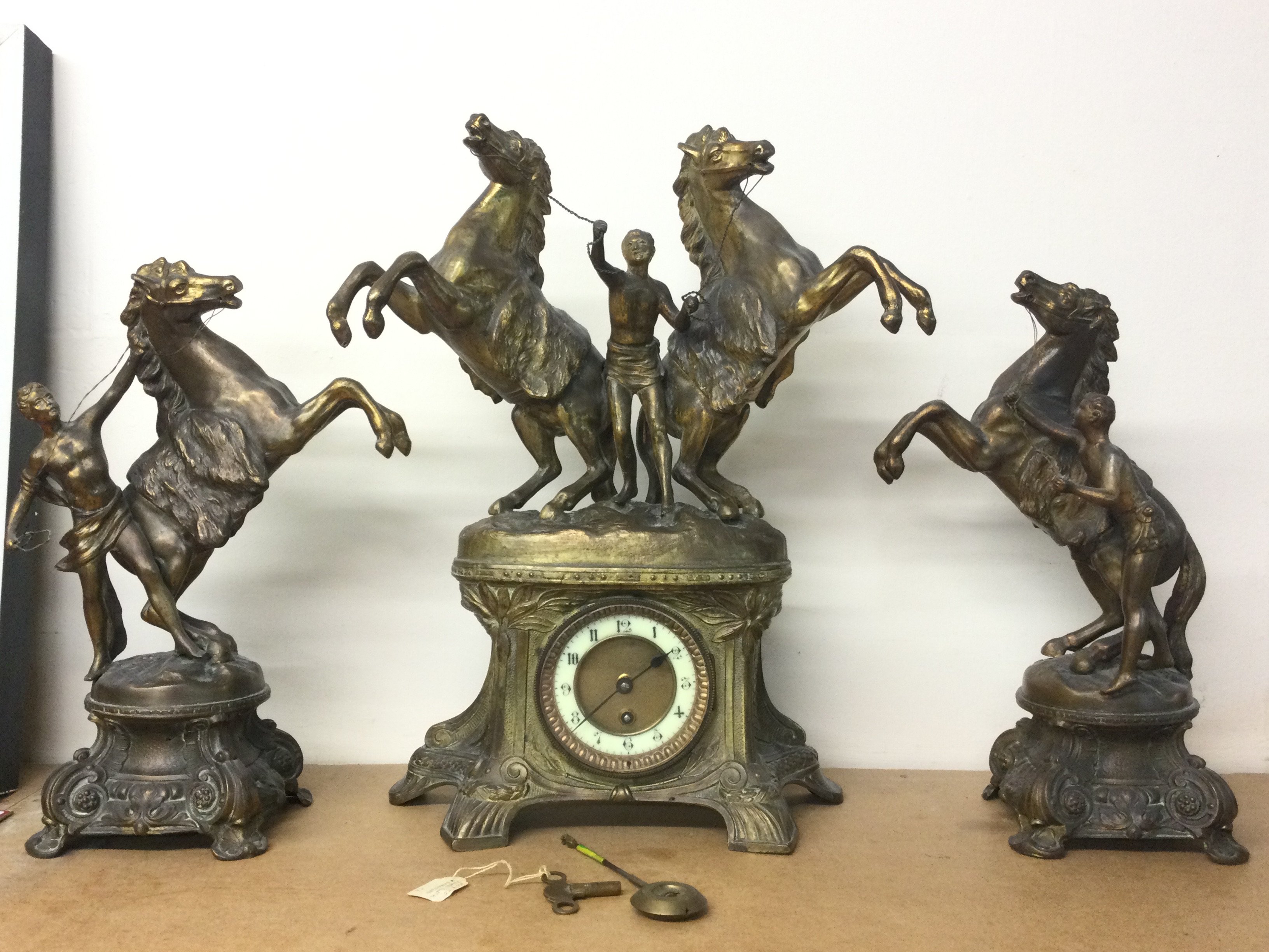 Three piece Spelter Marley horse clock set 43 and 35cm tall. This lot cannot be posted