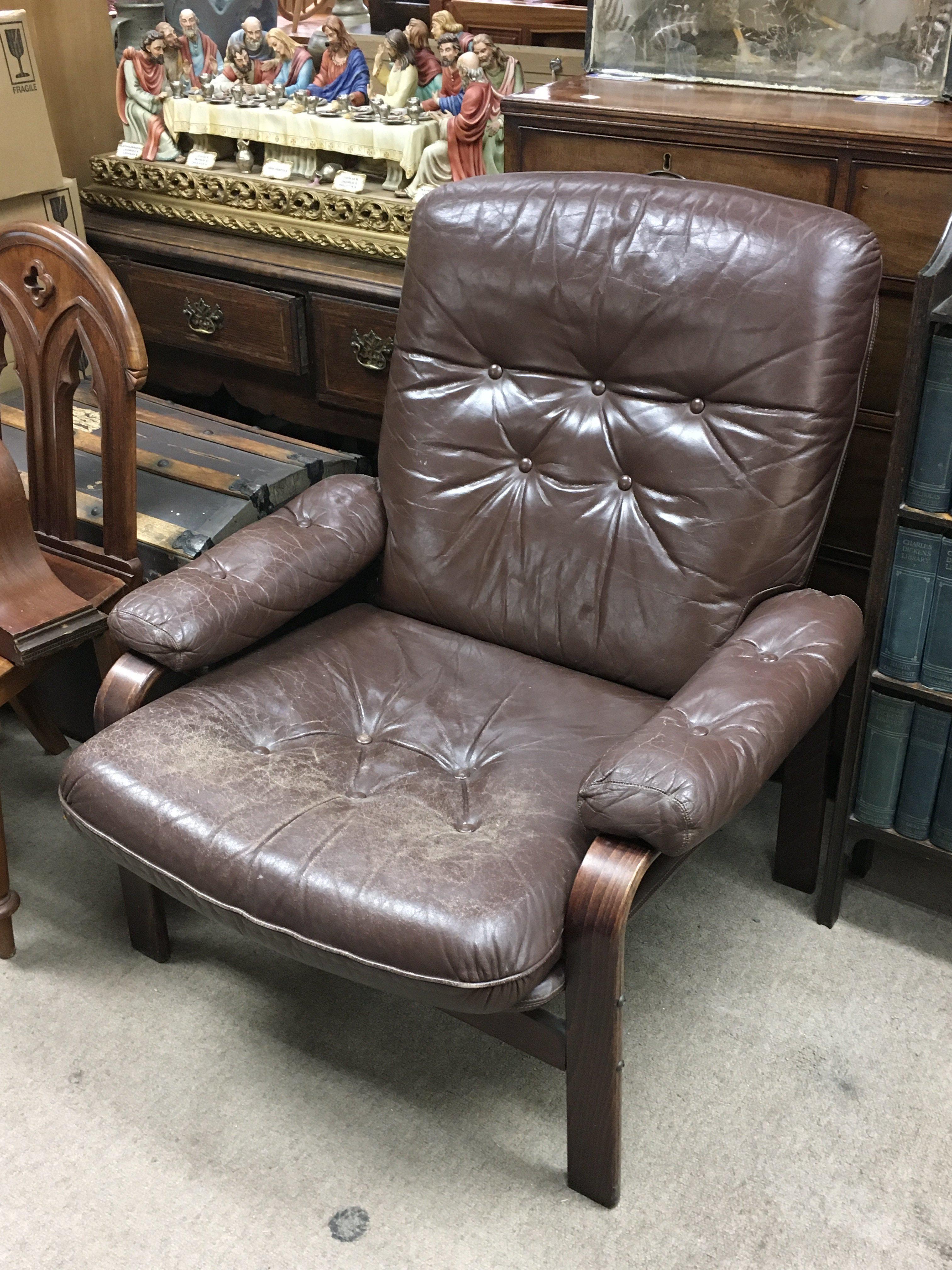 A teak and leather Ulferts Swedish armchair