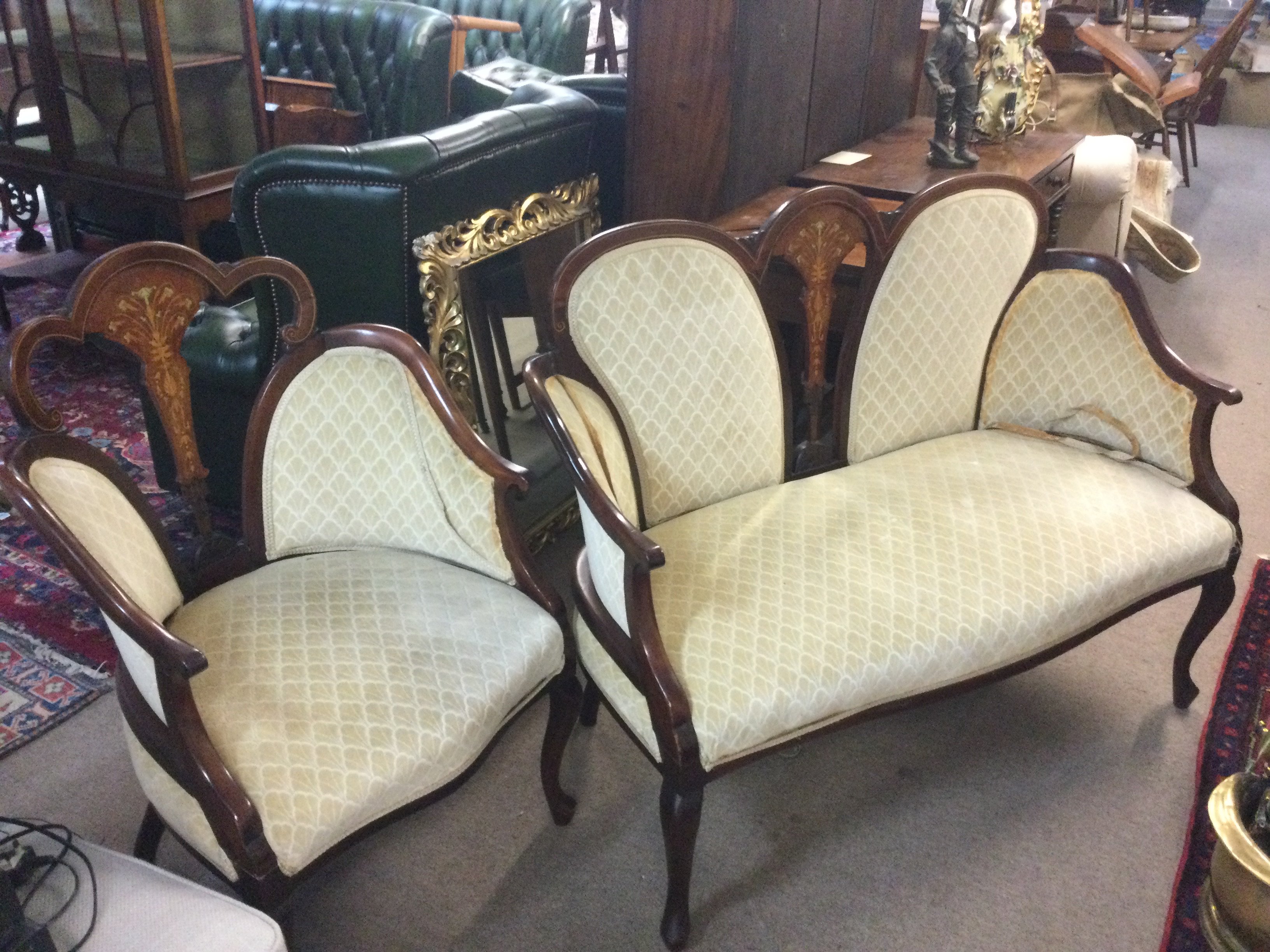 An Edwardian inlaid chair 94cm tall 58cm wide 54cm deep with matching two seater, dimensions 120cm wide 94cm tall 55cm deep