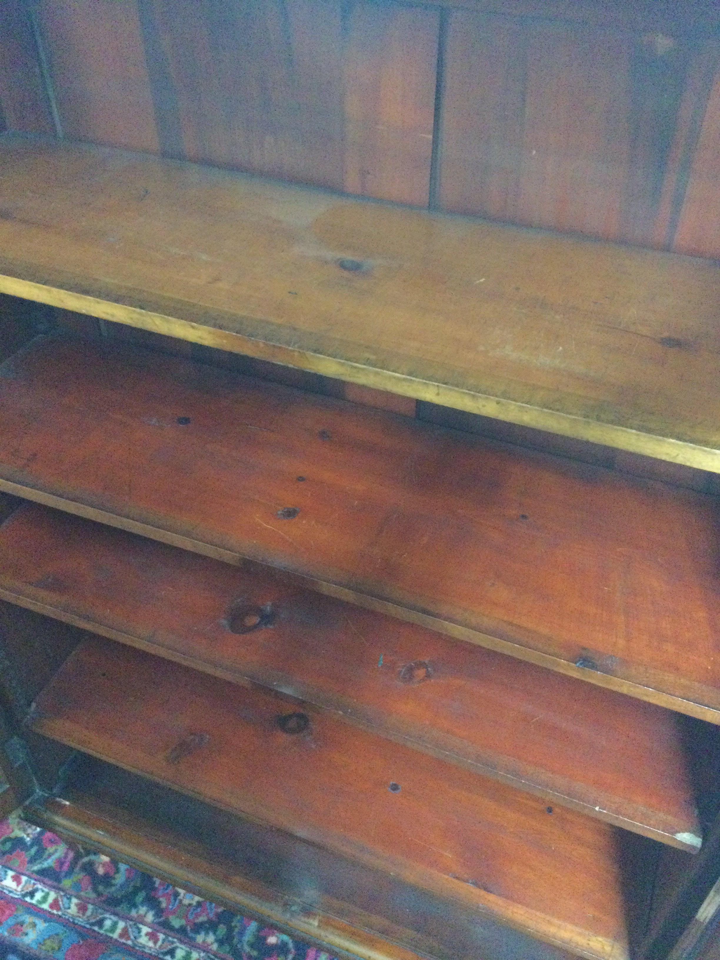 A mahogany bookcase cabinet with glass doors , dimensions