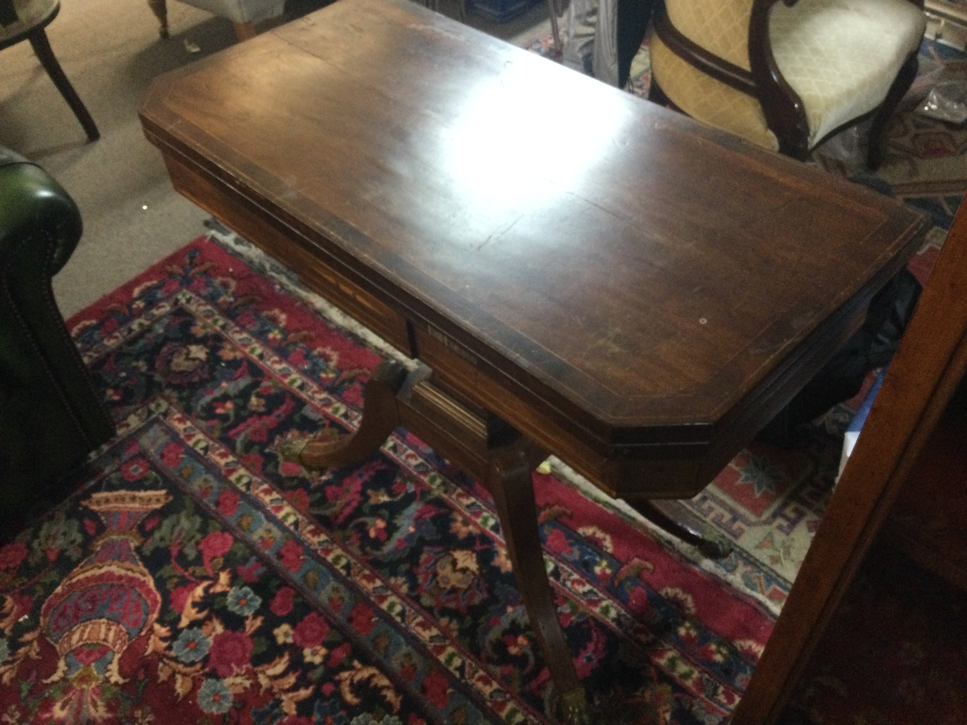 An inlaid regency style card table with a green leather top 76cm tall 89cm wide 44cm deep approximately . Games table 89x89cm