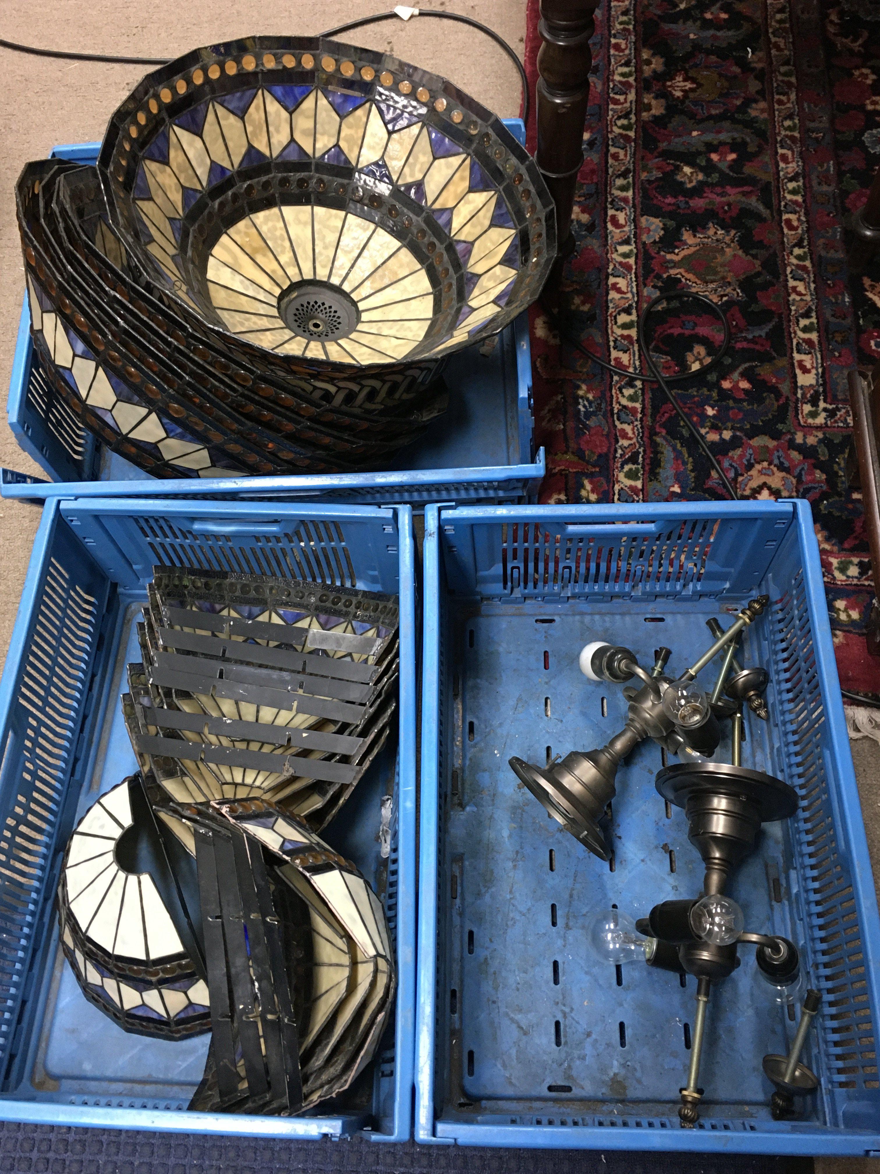 A Collection of Tiffany style lamp shades , side lights . The two pictured 49 and 39cm wide approximately .This lot cannot be posted