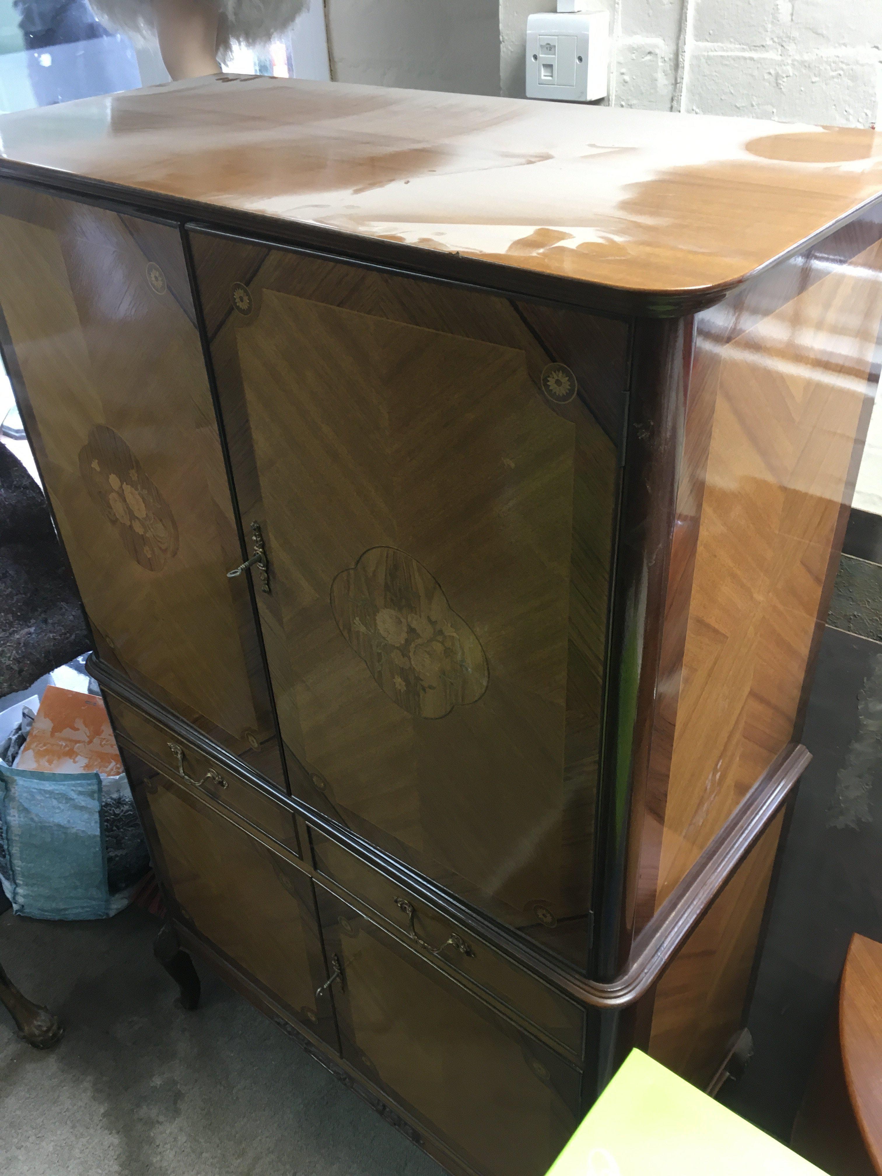 A reproduction Marquetry cocktail cabinet. With keys . 90cm wide 150cm tall 44cm deep