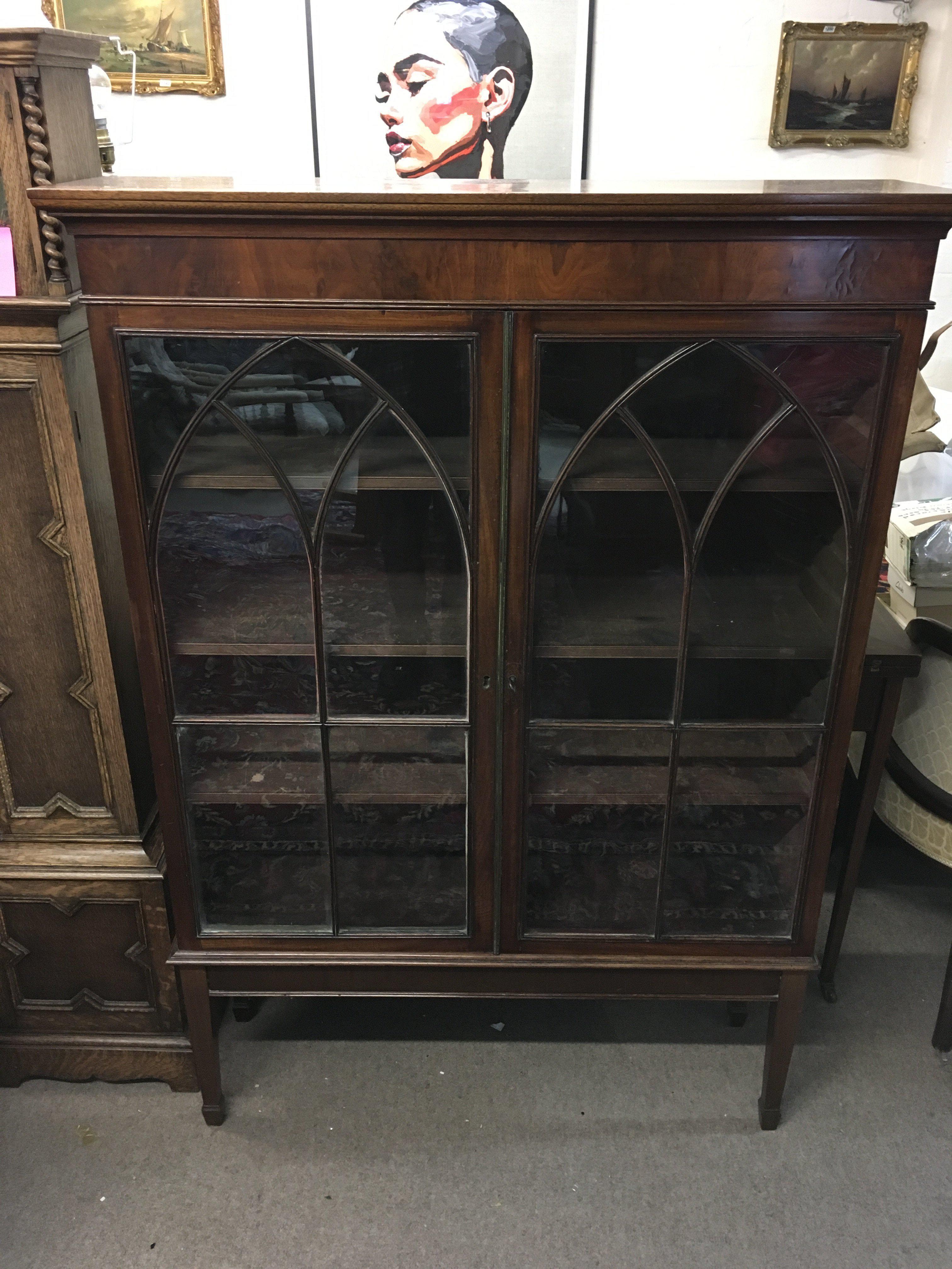 A mahogany display cabinet, dimensions 100cm wide 142cm tall 28cm deep