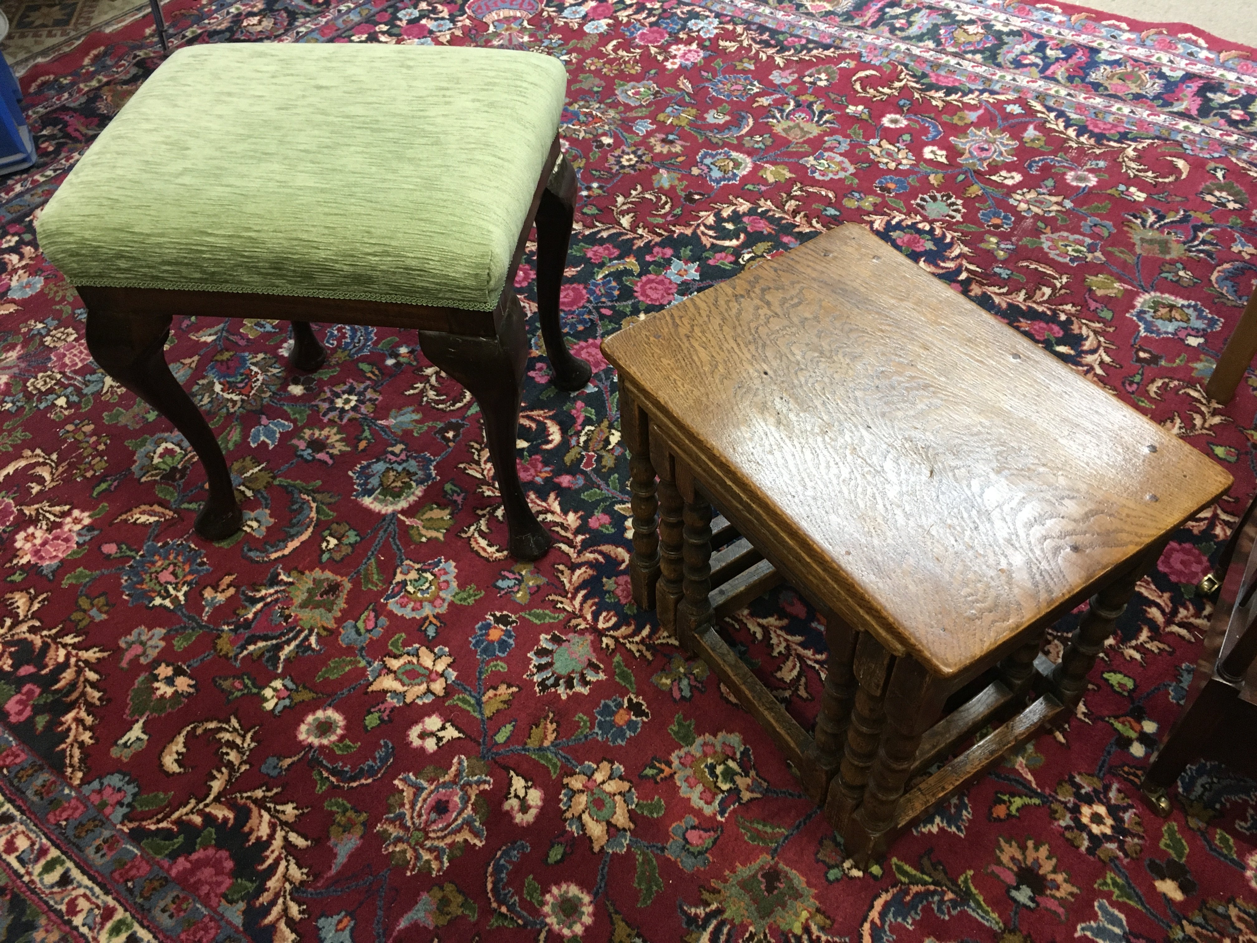 A mahogany stool 52cm tall 50cm wide and a nest of oak tables 44cm tall 48cm wide