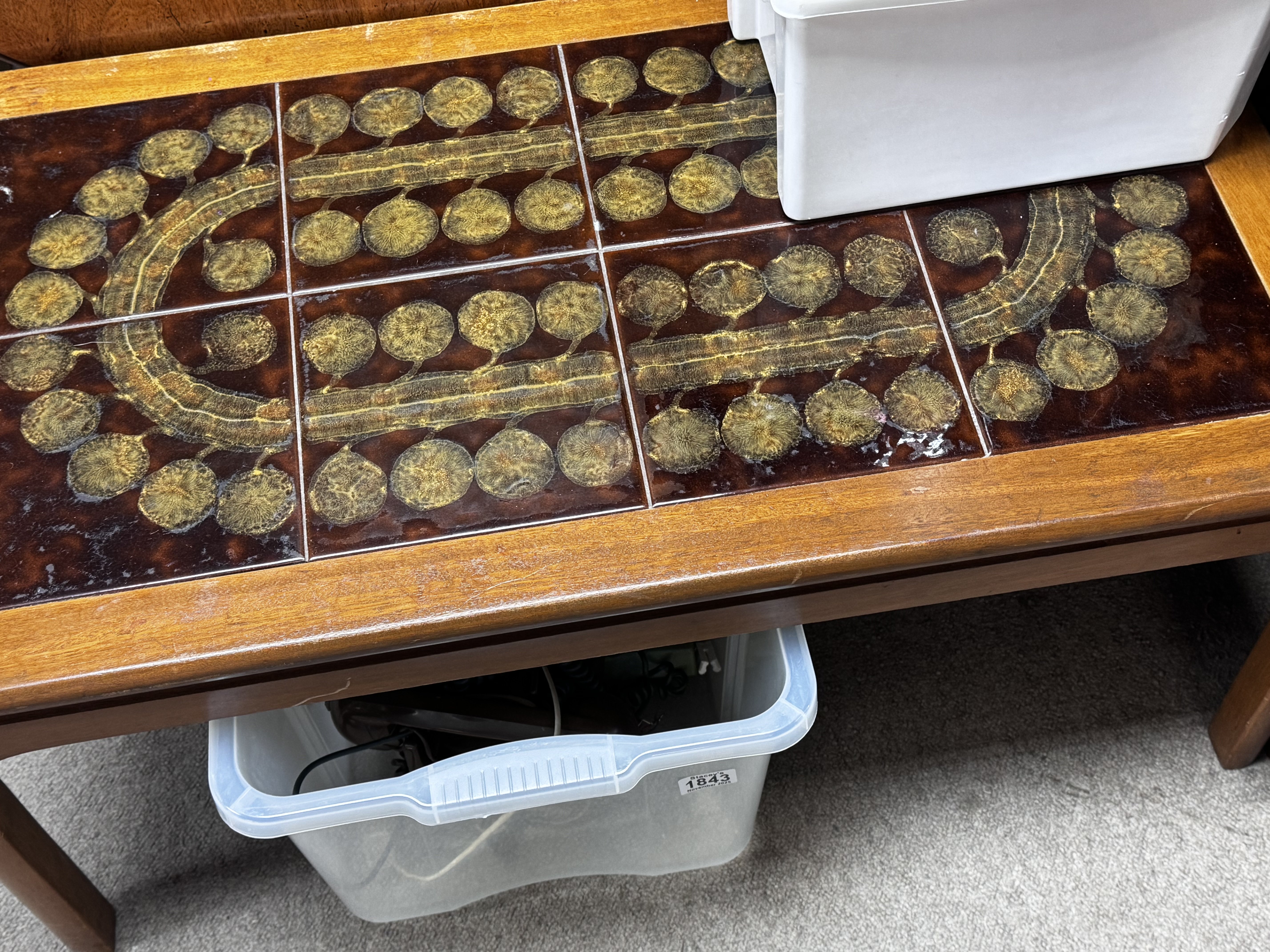 A 1960s tile topped coffee table. 91cm x 50cm x 41cm