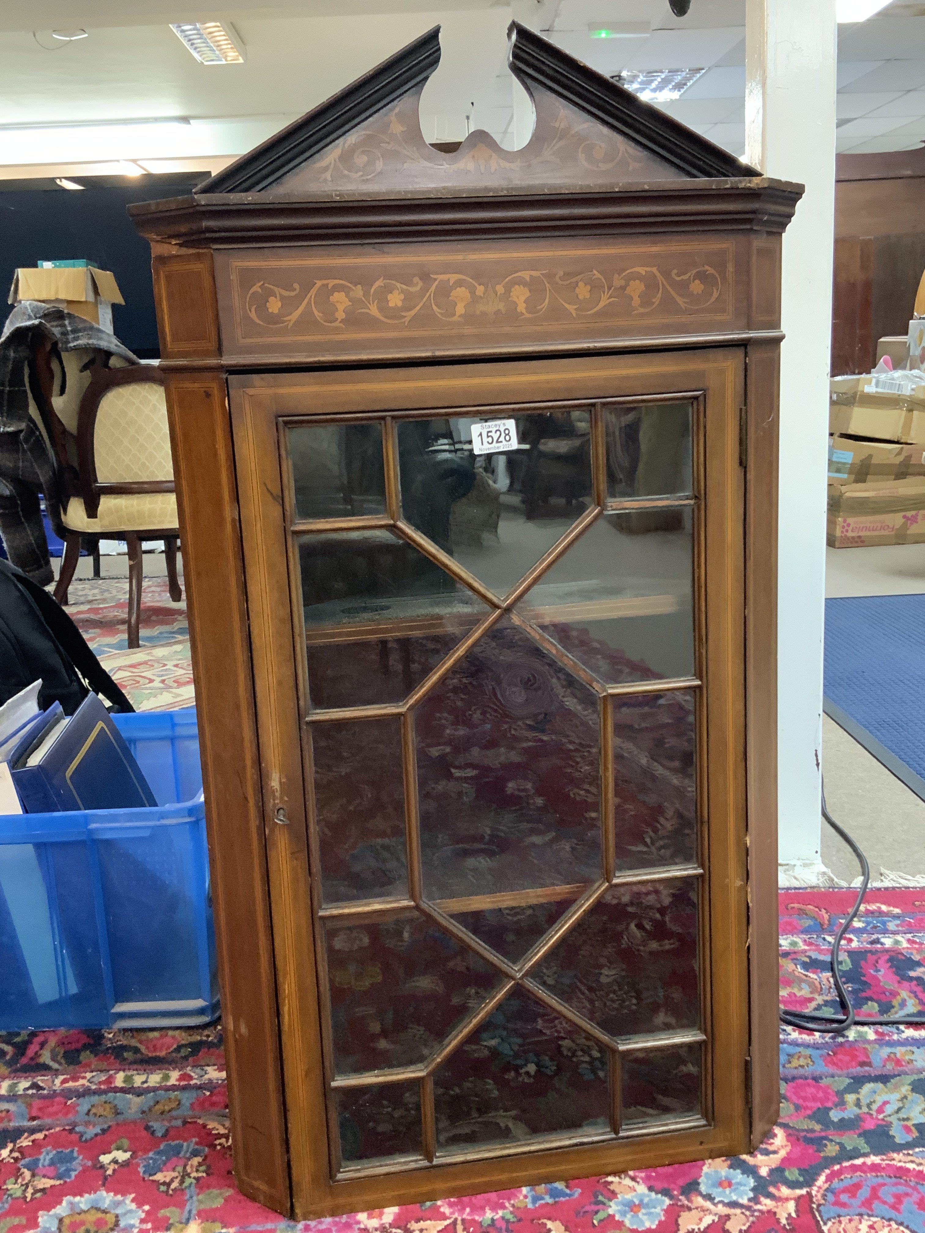 A small Edwardian wall mounted corner display cabinet. 104cm.