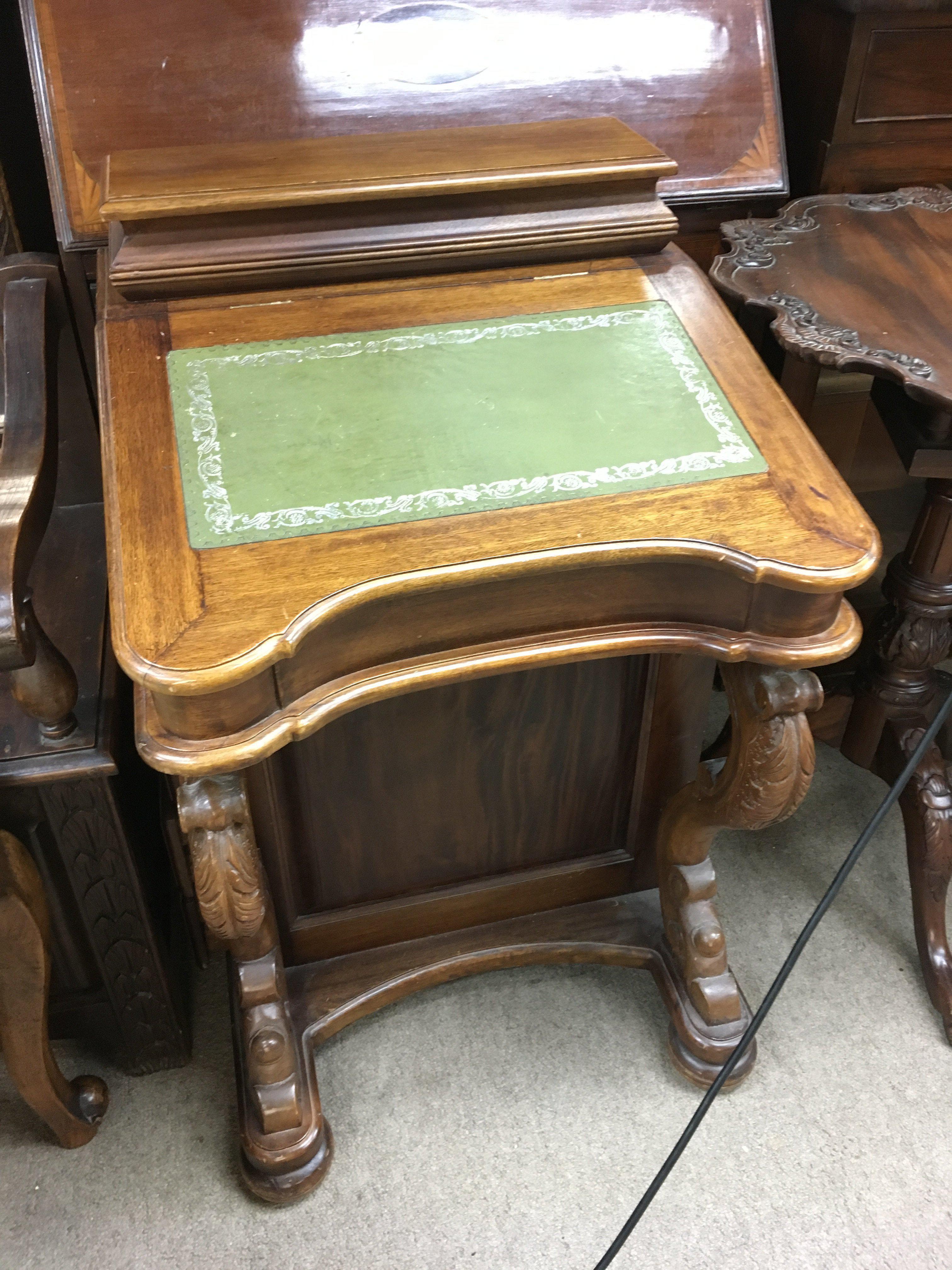 A reproduction davenport. Shipping category D.