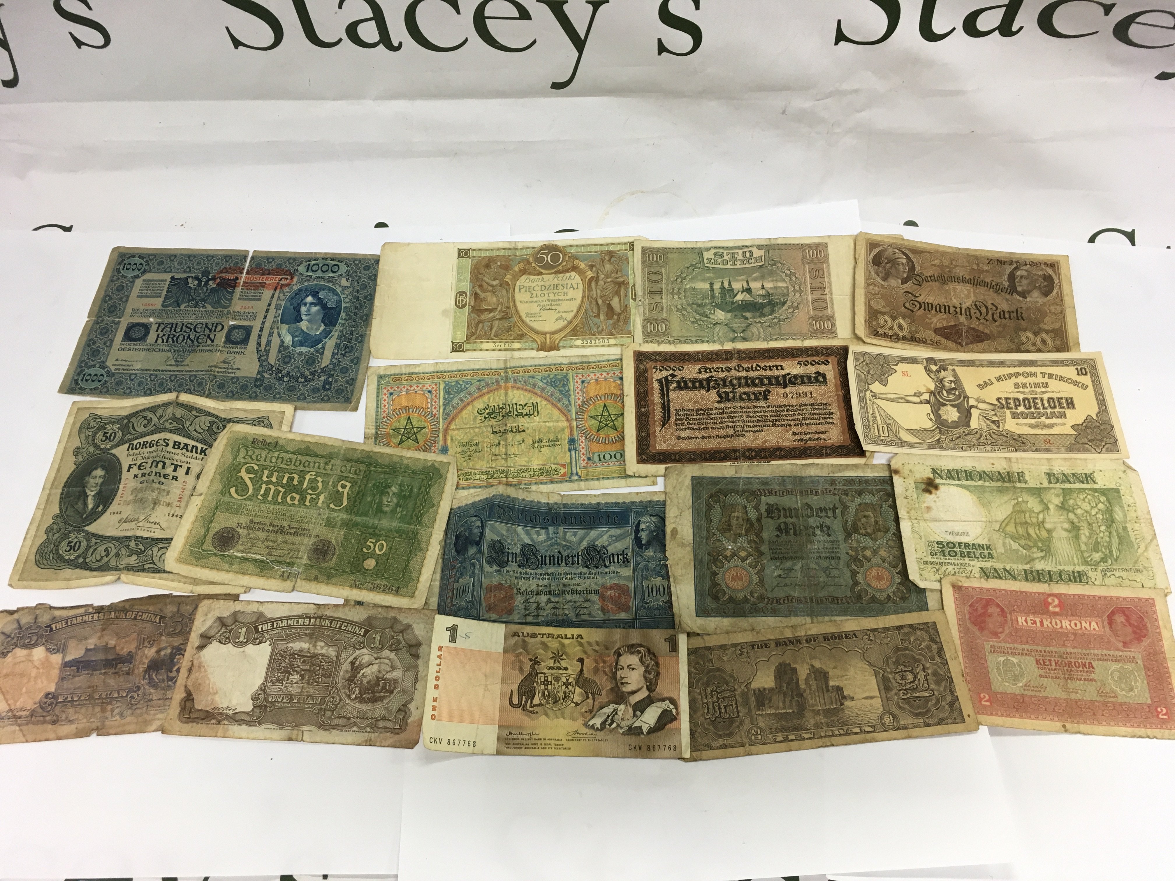 A collection of used world banknotes. Shipping category A.