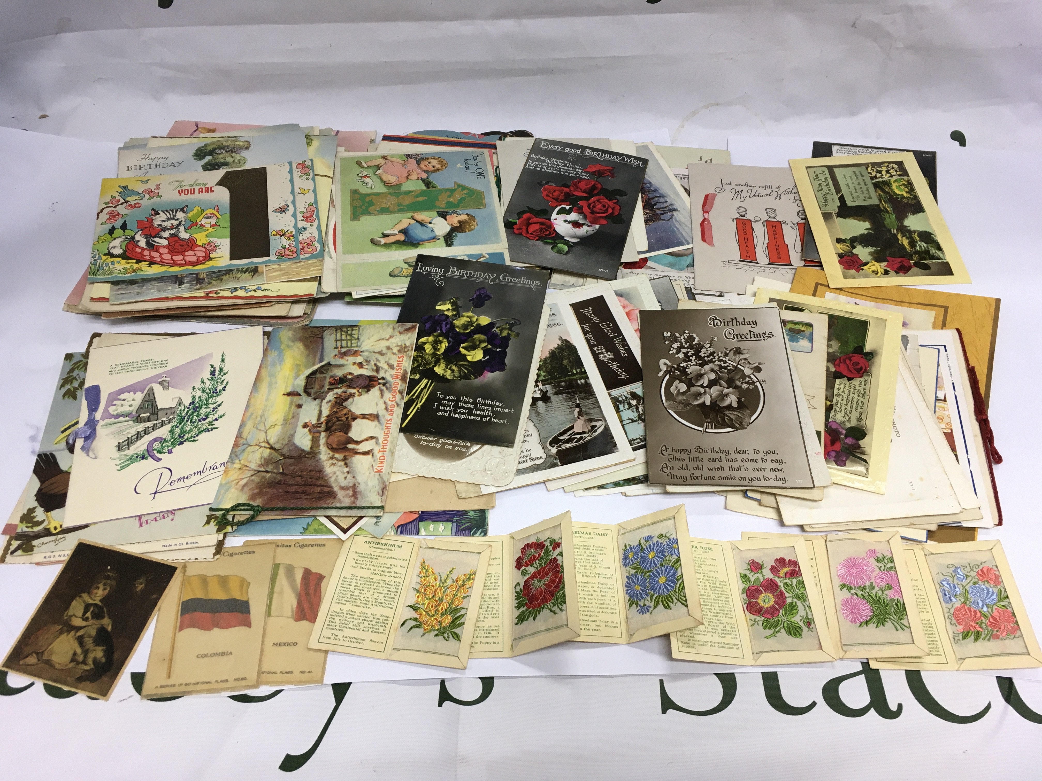 A collection of vintage postcards and greetings cards. Shipping category B.