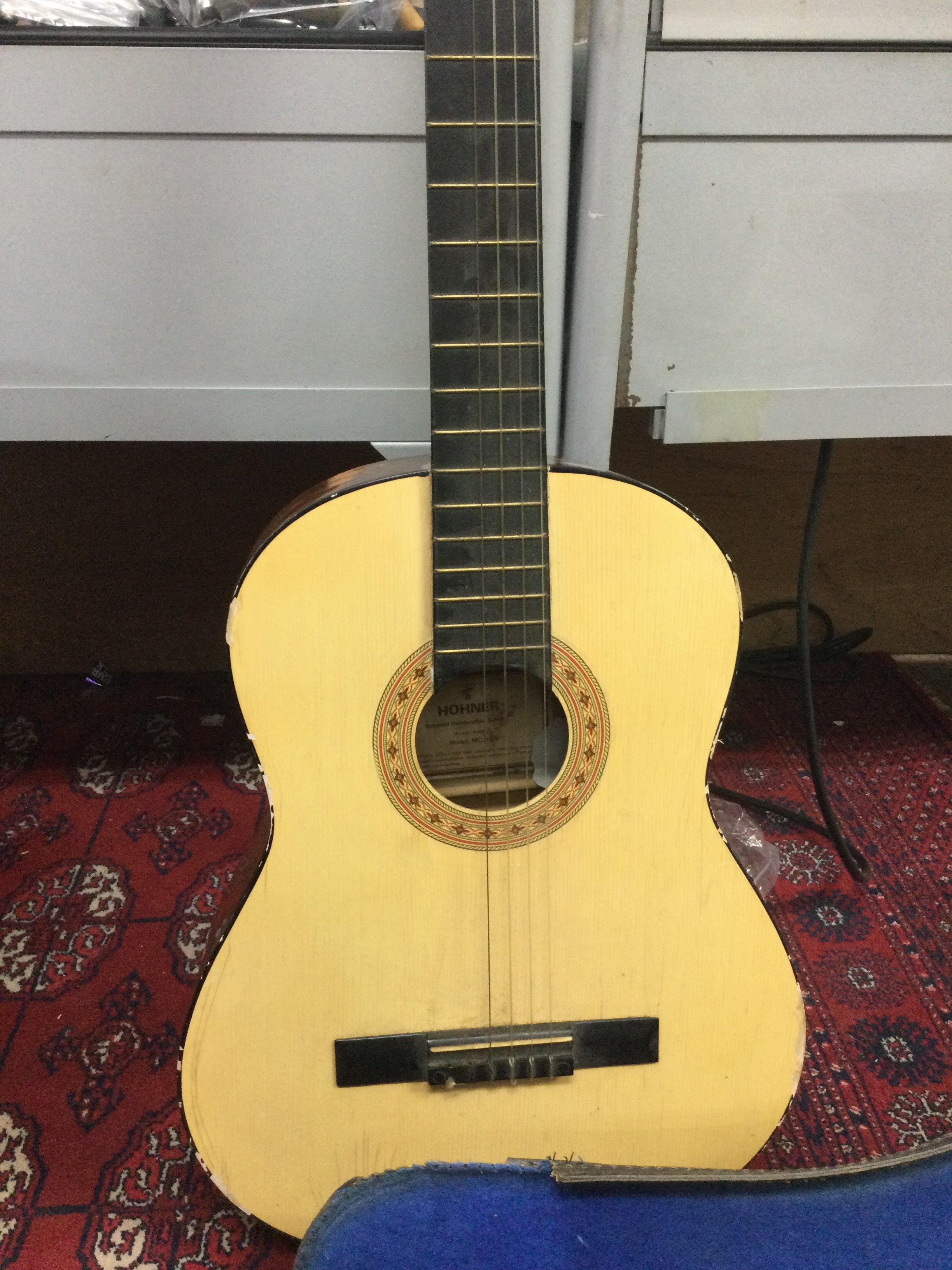 An acoustic Horner model MC 05 classical acoustic guitar and cased a John Grey & Sons Banjolele. NO RESERVE