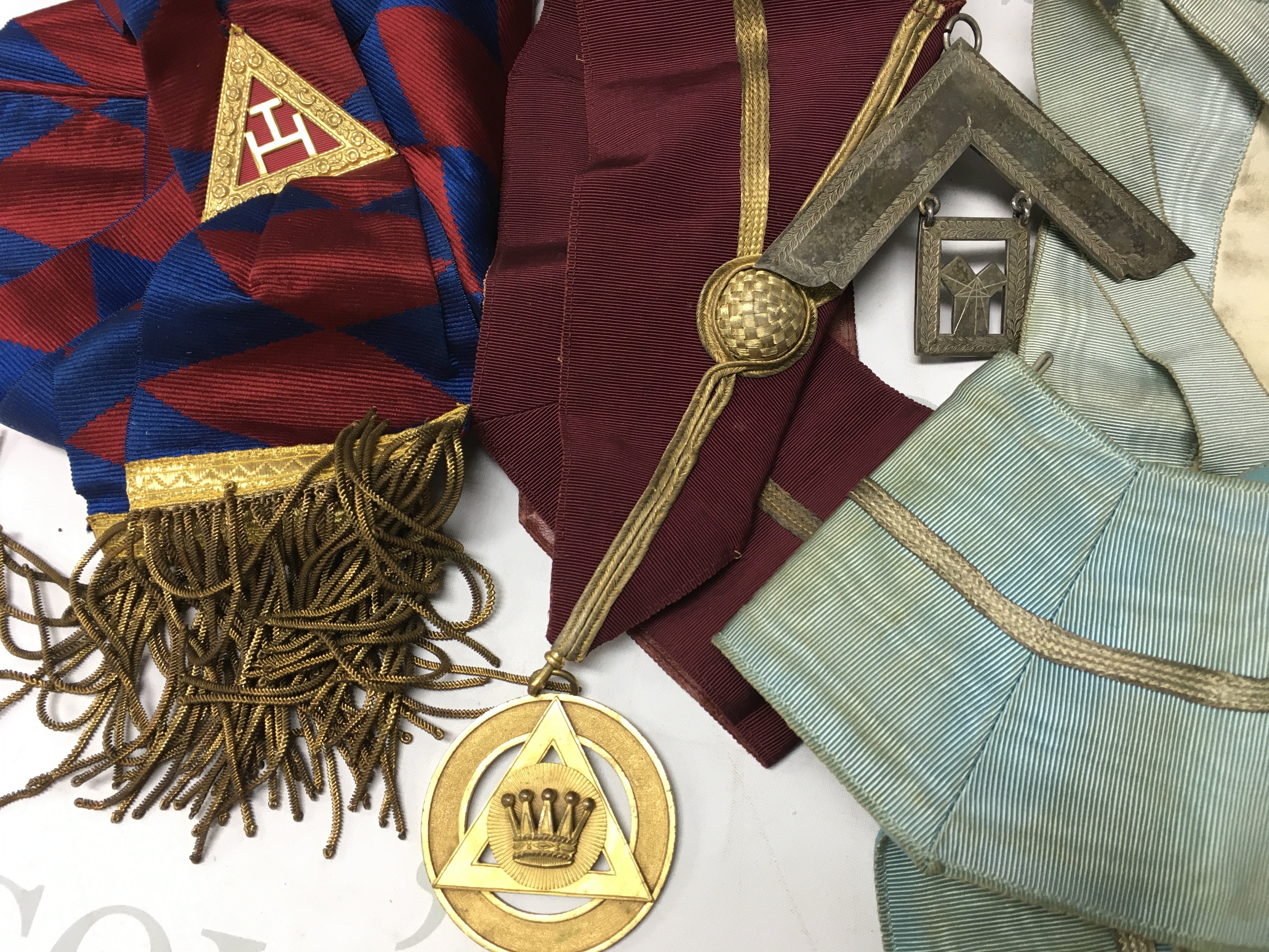 Masonic Regalia and three silver medals , postage catC. NO RESERVE