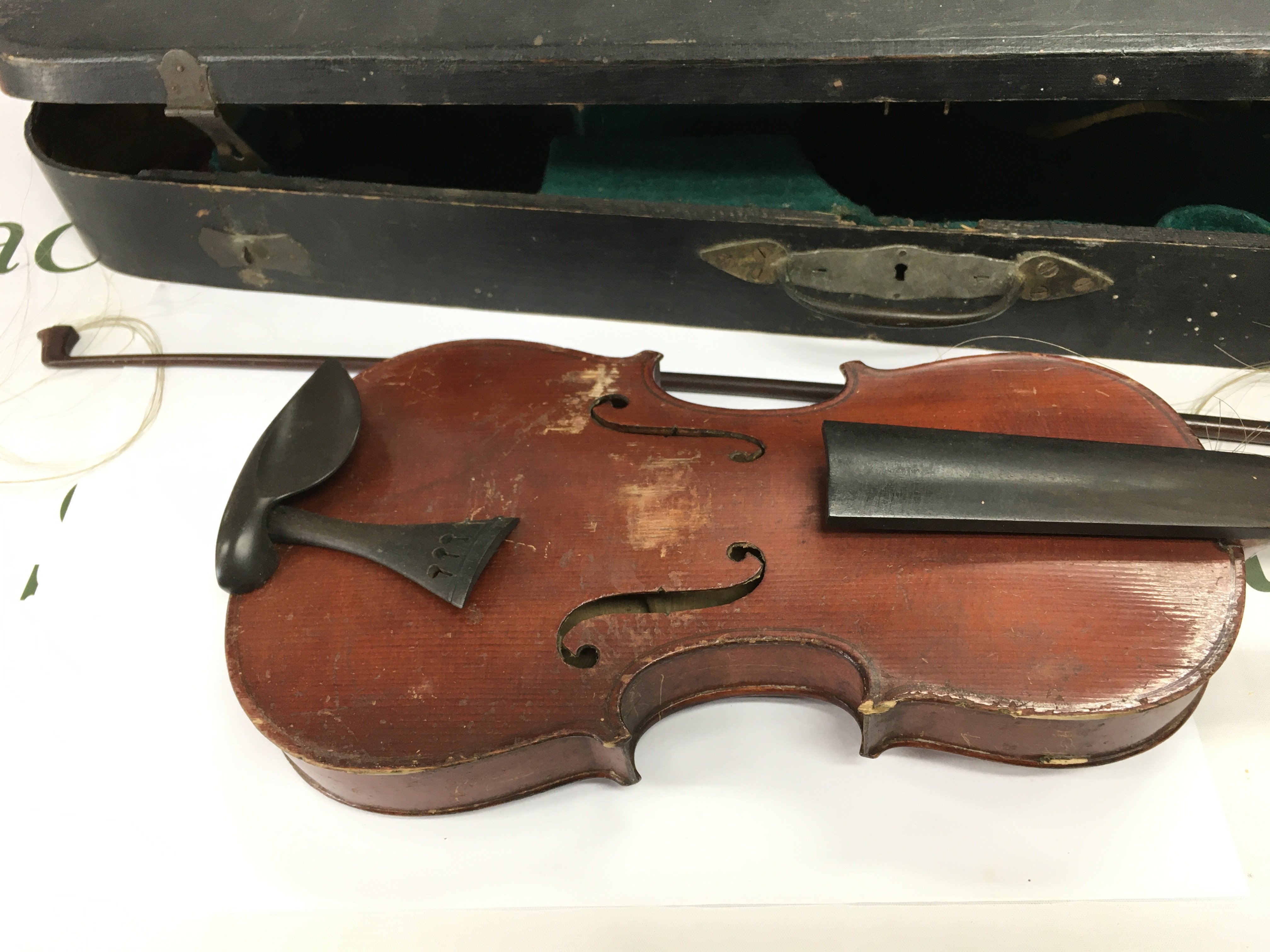 A 1930 cased violin in need of repair. NO RESERVE