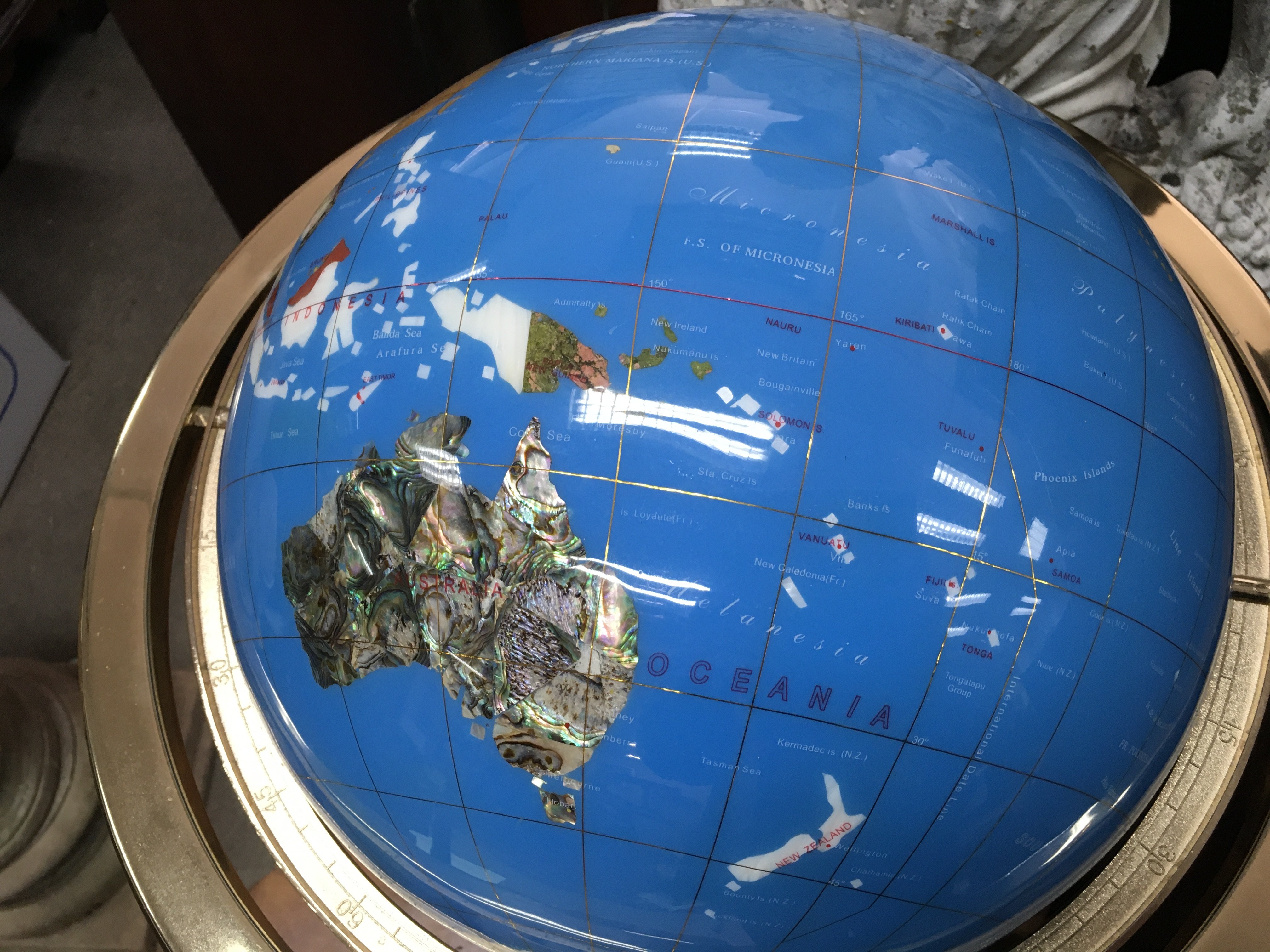 A gemstone globe, 50cm tall approximately . This lot cannot be posted. NO RESERVE