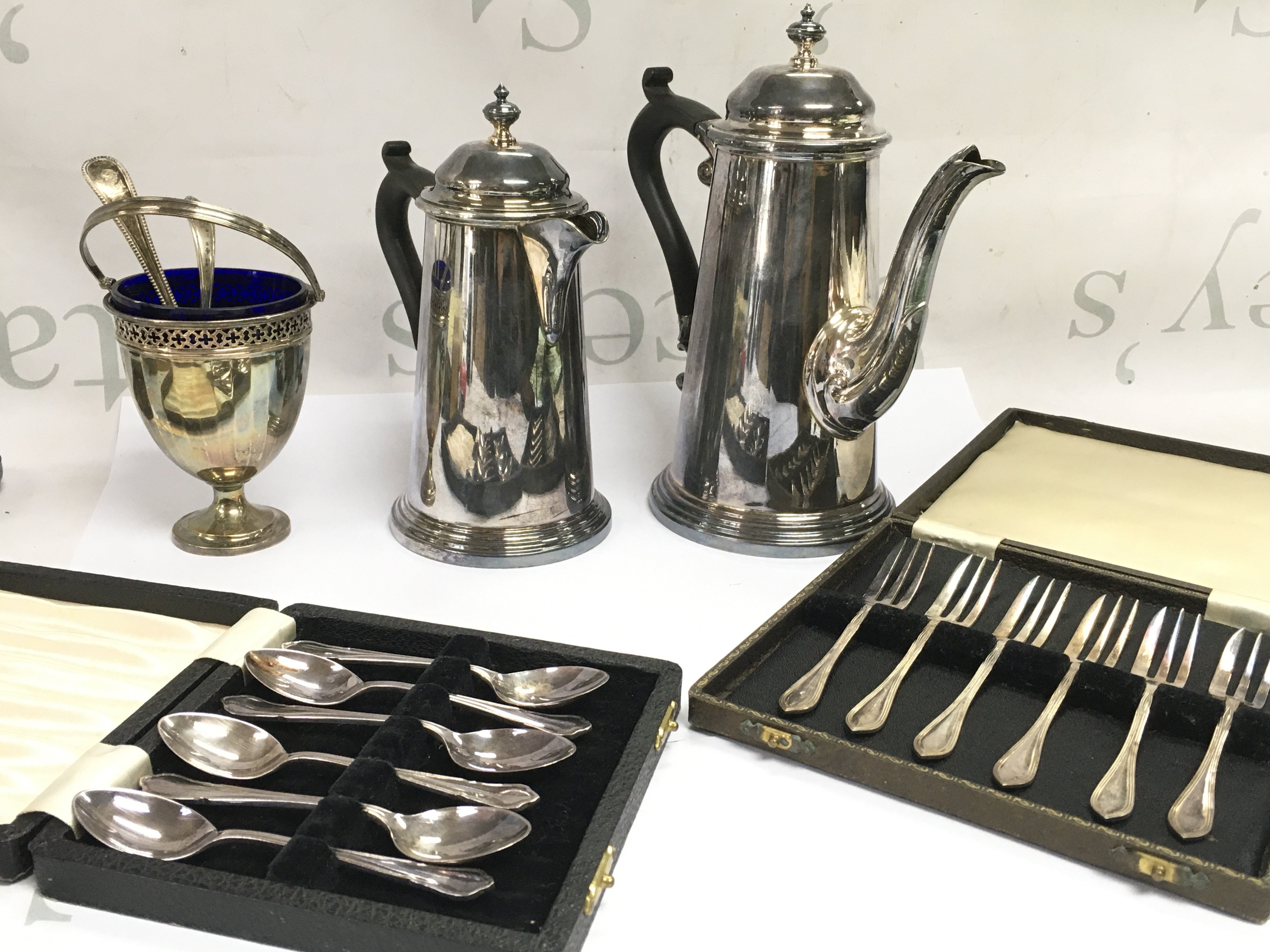 Silver plated coffee pots, cased cutlery , silver hallmarked sugar bowl . Postage category B