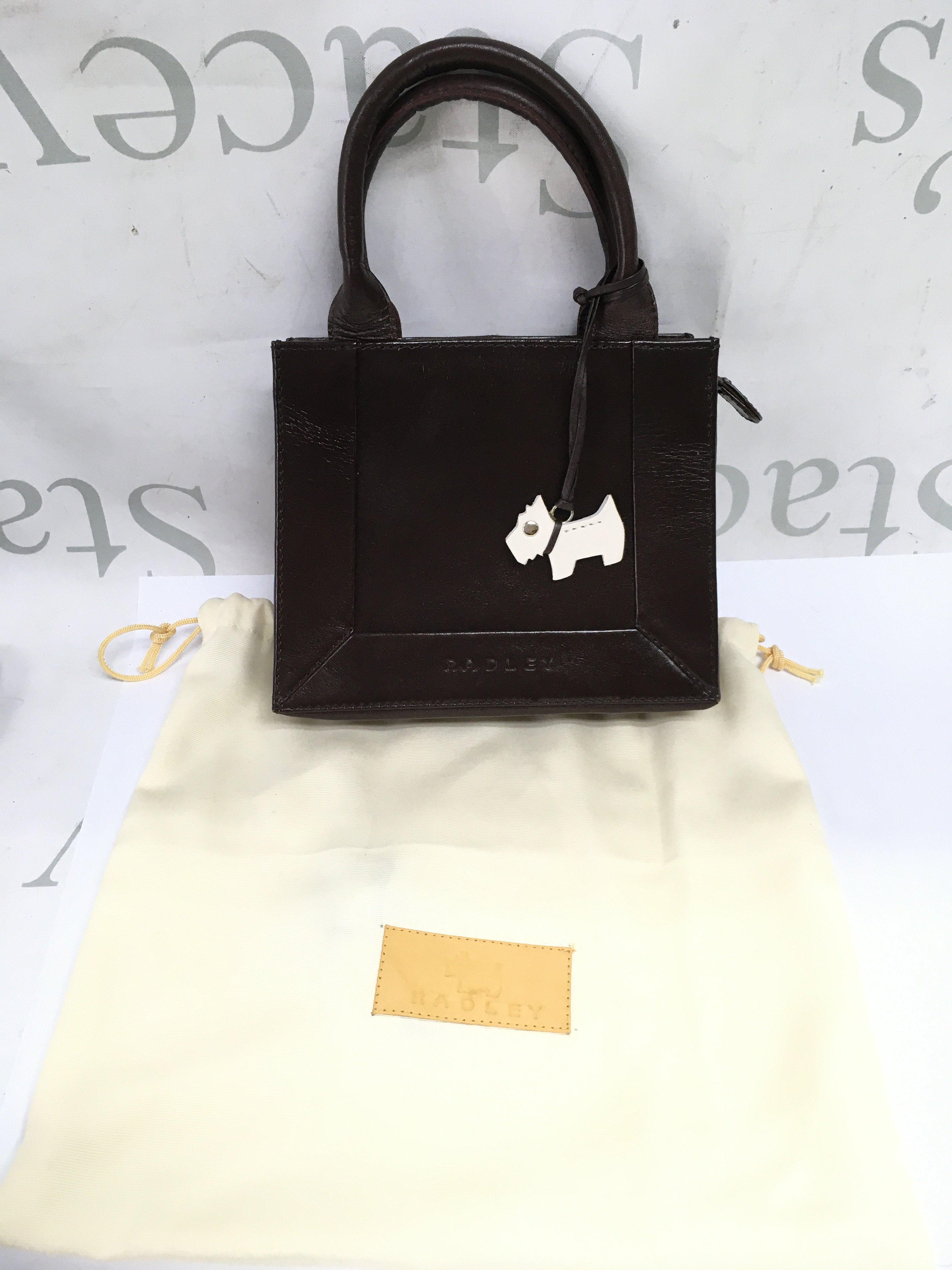 A Radley small brown leather handbag , postage cat B