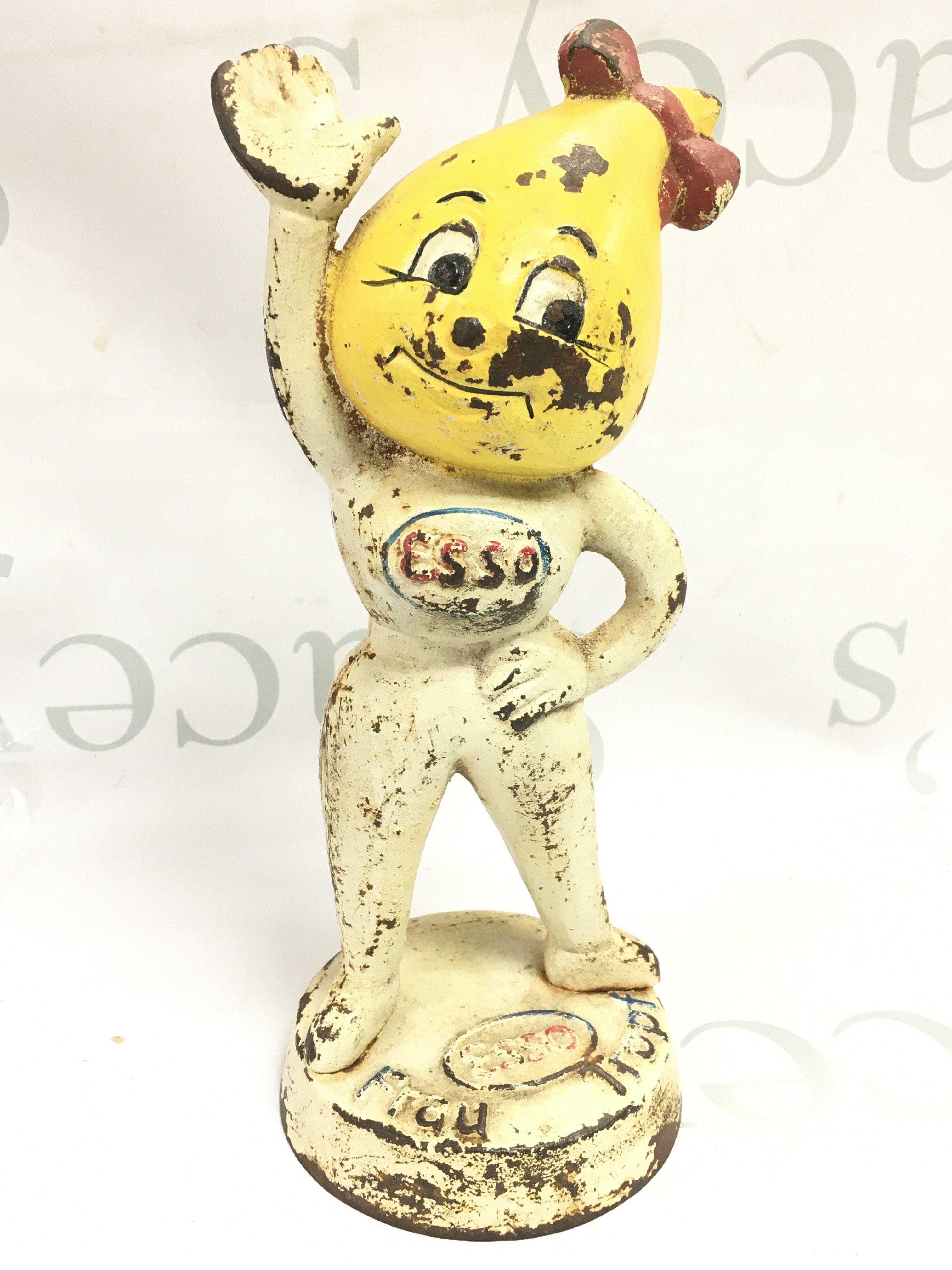 An old metal painted small Esso Advertising money box figure . Postage cat b