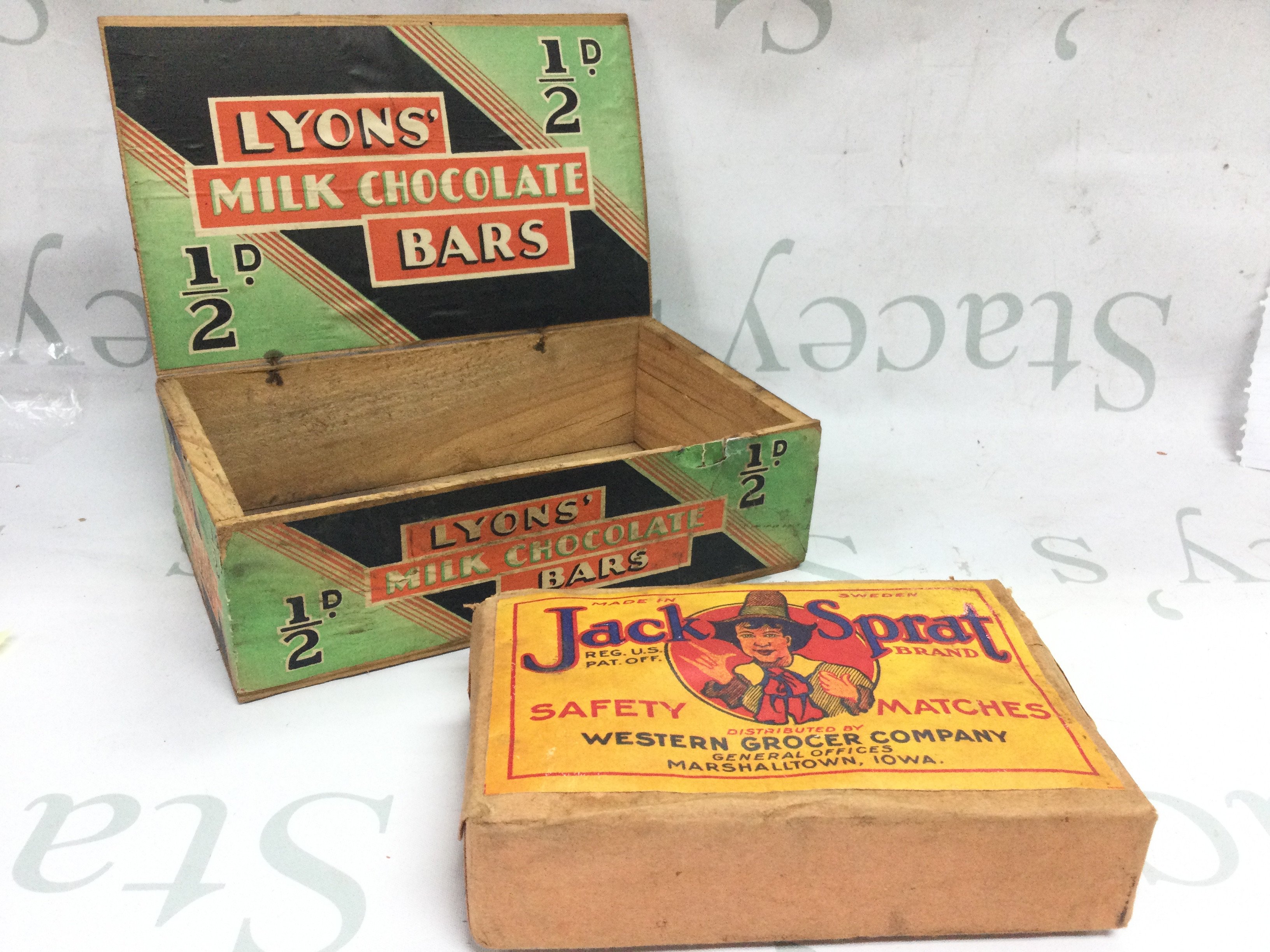 A good jack sprat vintage unopened pack of safety matches distributed by Western Grocier Company Marshall town Iowa USA and vintage small wooden box for Lyons milk chocolate bars . Postage category b