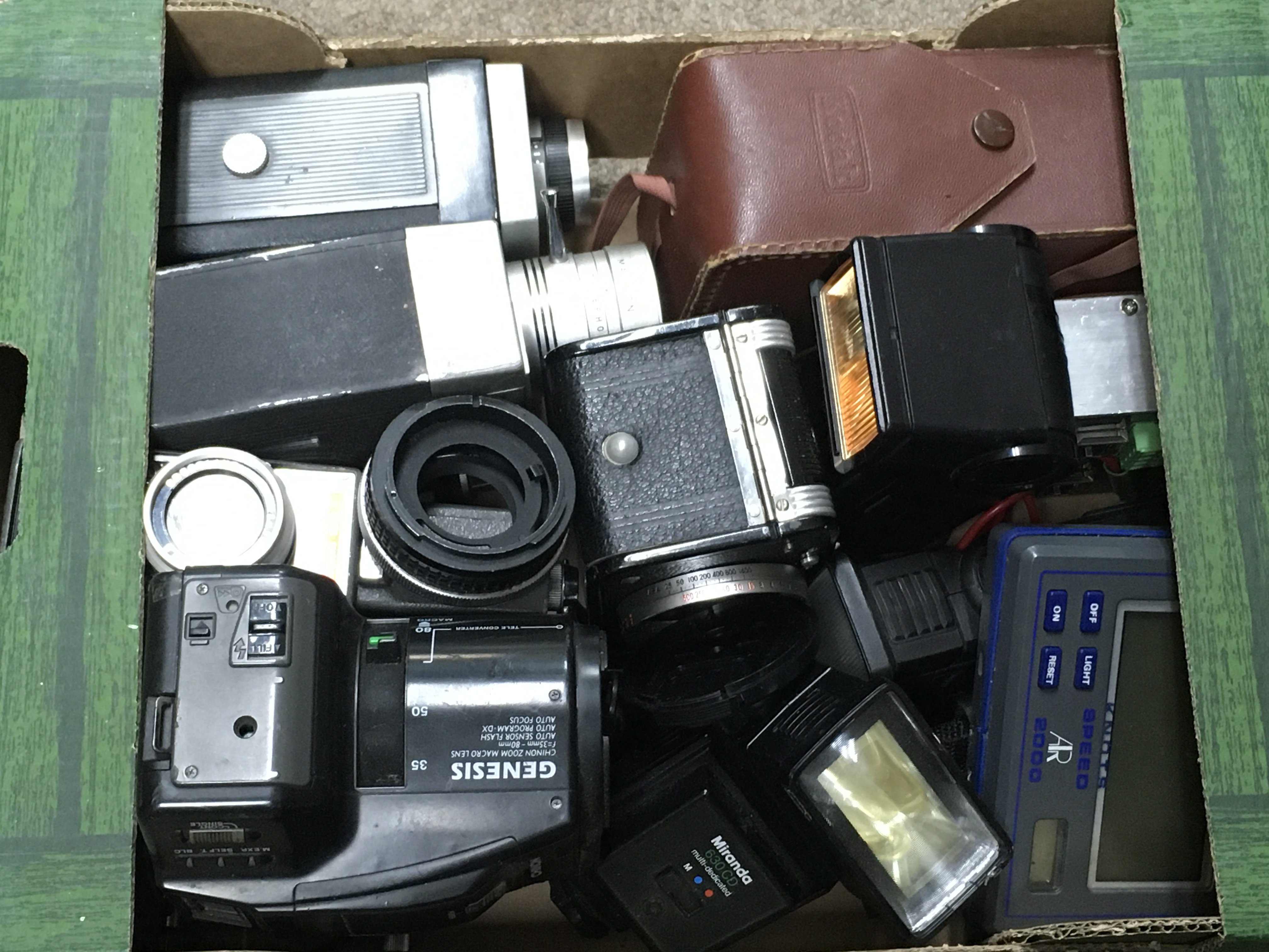 A box of vintage camera accessories . No reserve Postage category c