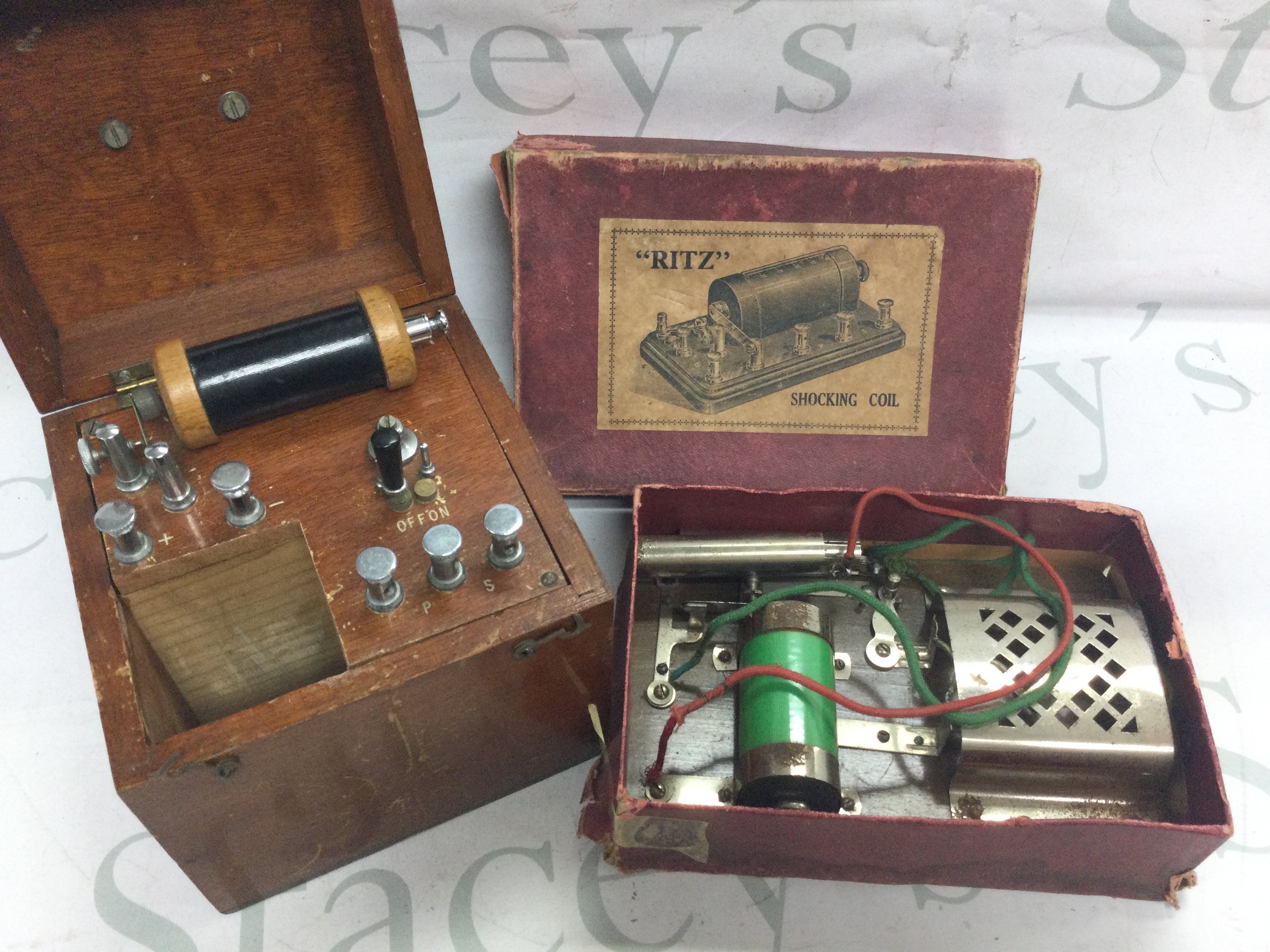 Two electric shock devices . Postage category C