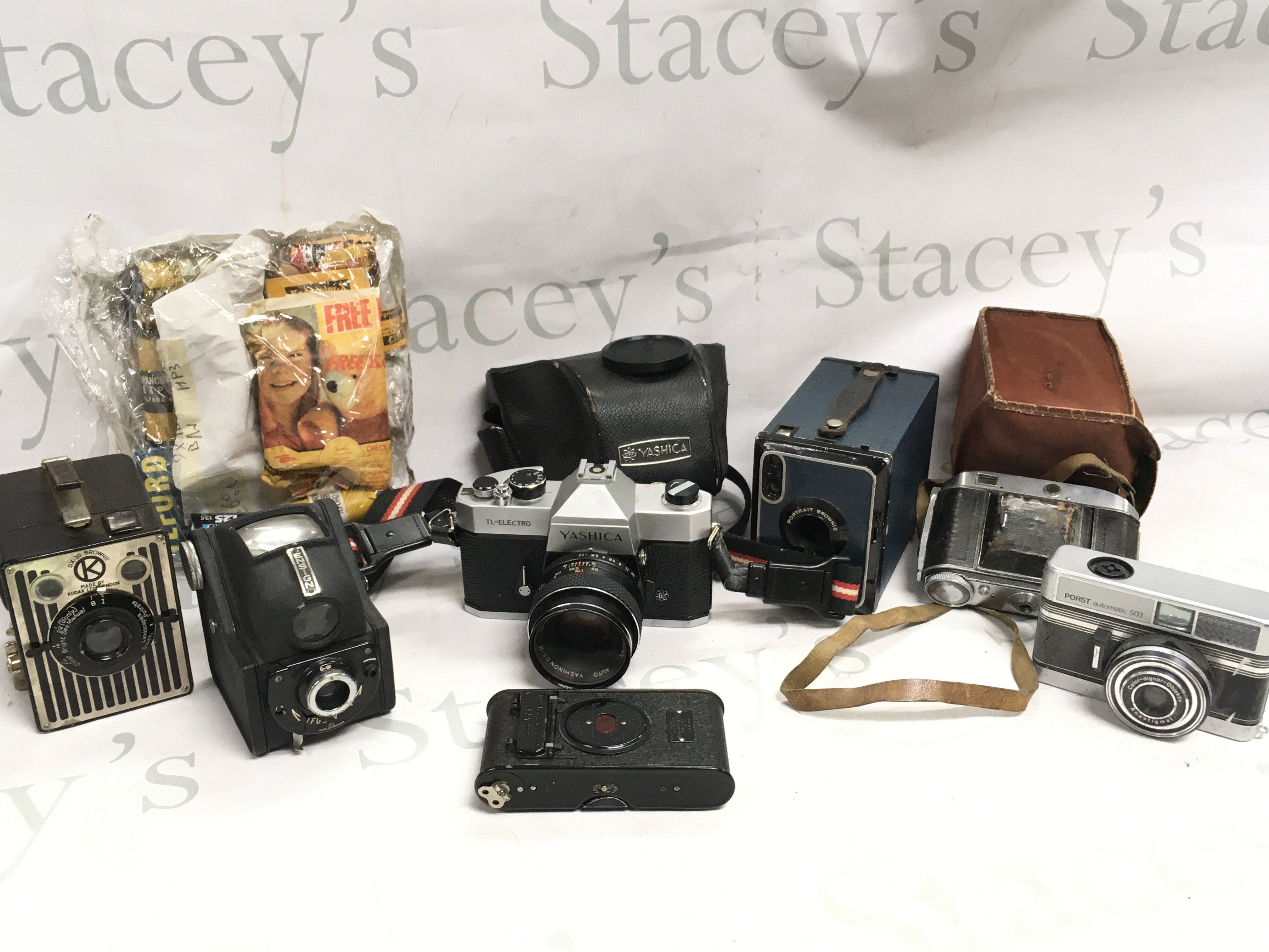 A collection of various vintage cameras including Kodak vest pocket camera no a 127, Ensign Ful Vue , Portrait brownie no 2 , SIX 20 brownie