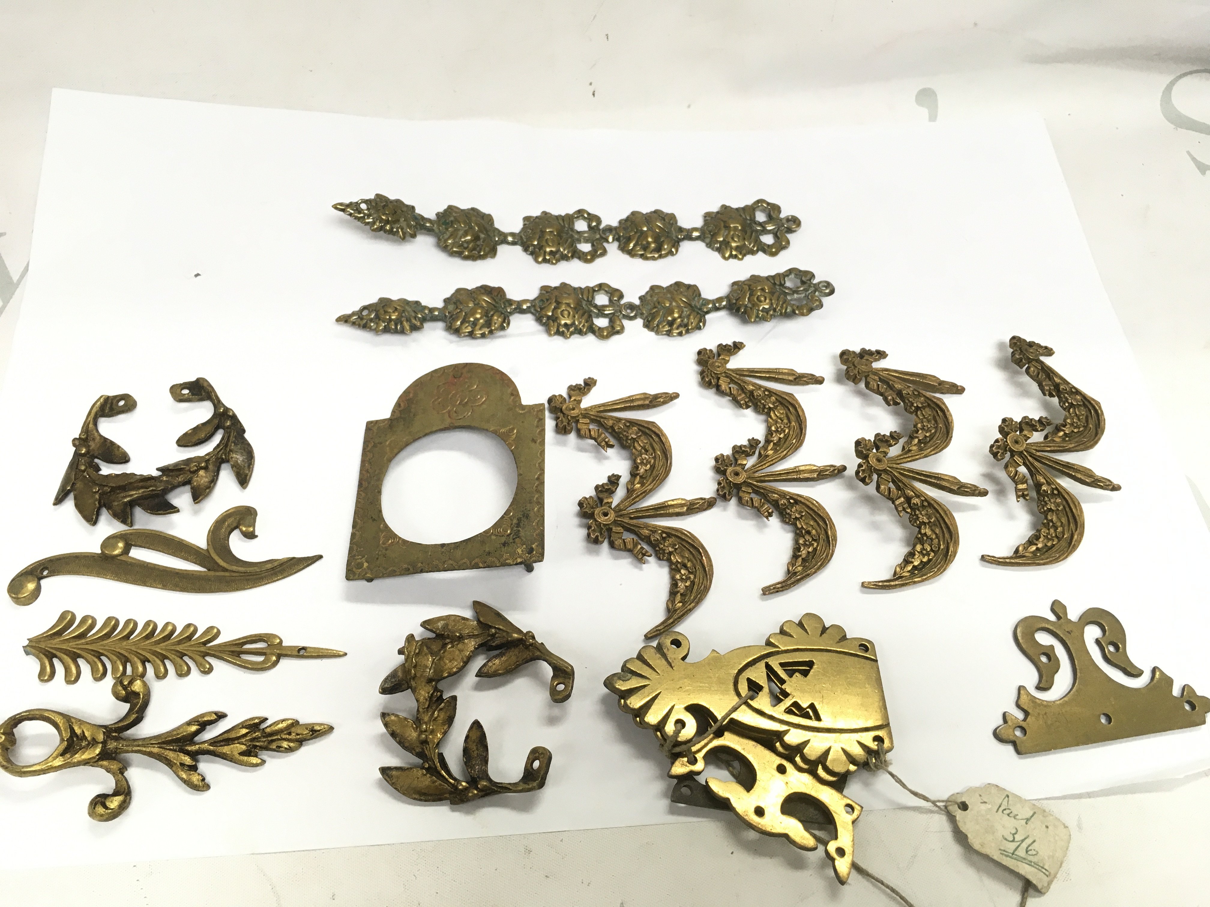 A lot of furniture and clock bronze fittings . Postage category A