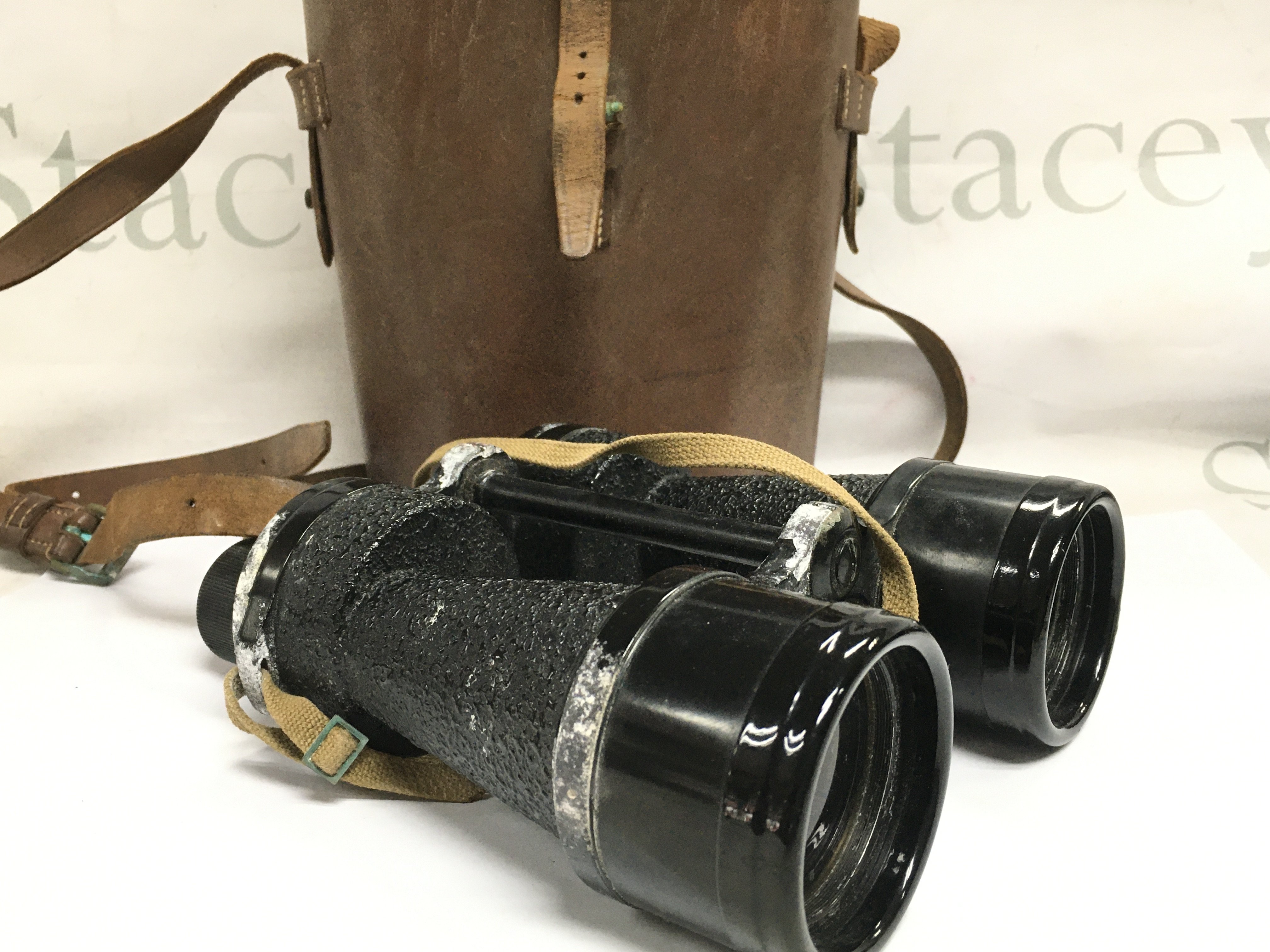 A cased pair of vintage Ross of London binoculars . Postage category b