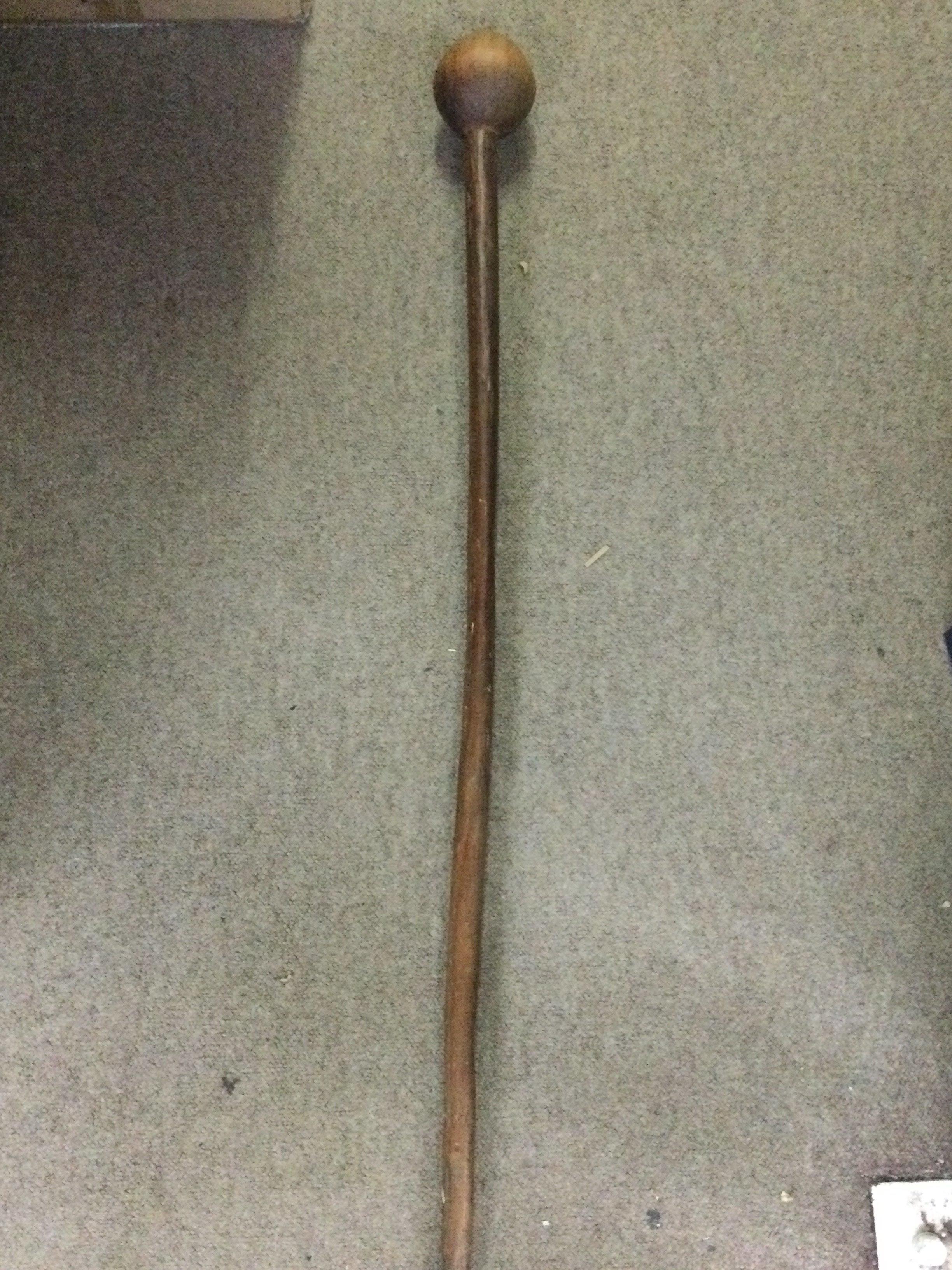 A vintage Teak Knob Kerry 108cm tall. This lot cannot be posted