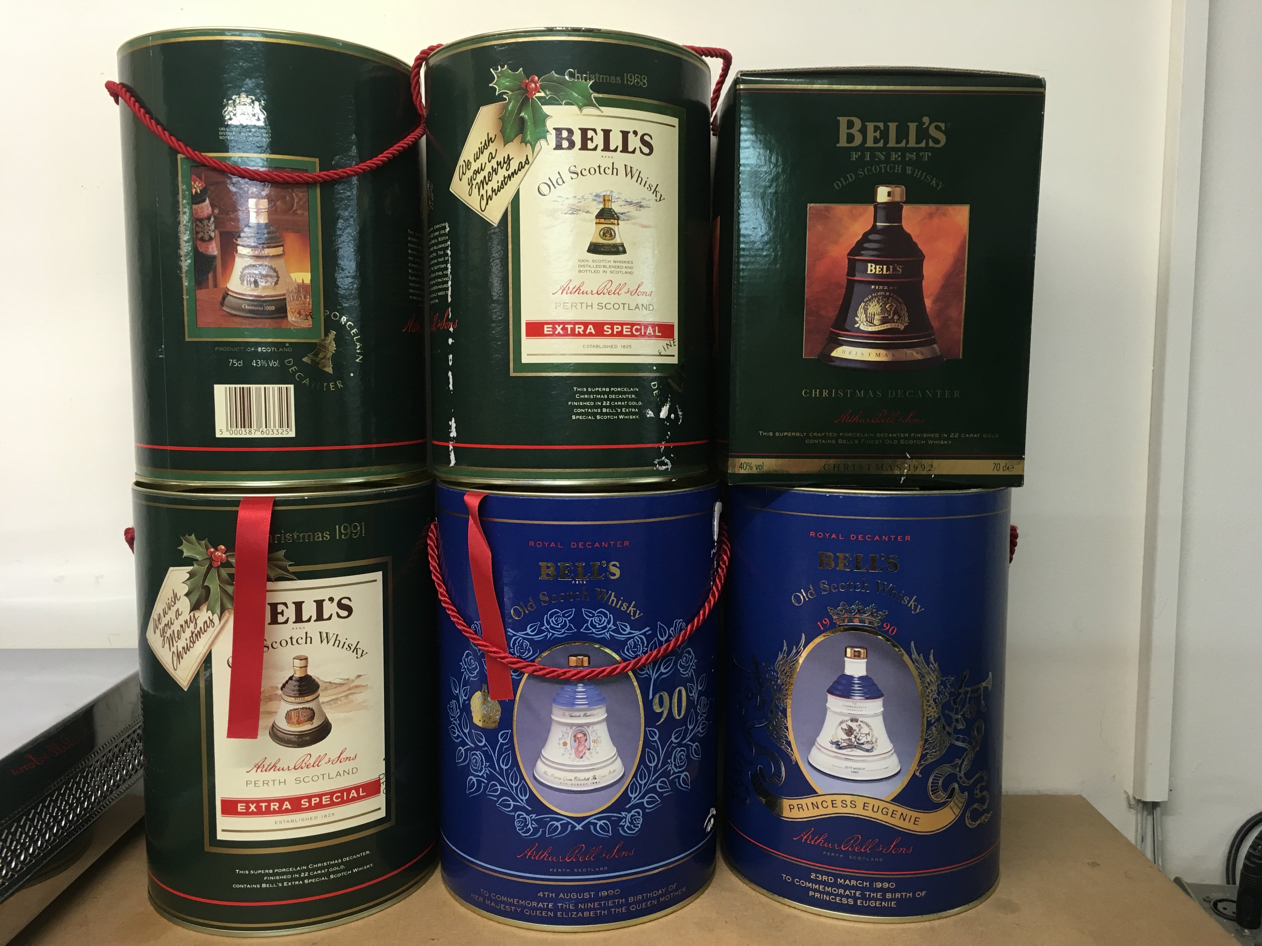 A Collection of 8 bell&#2013266057۪s whiskey boxed decanters including commemorative,