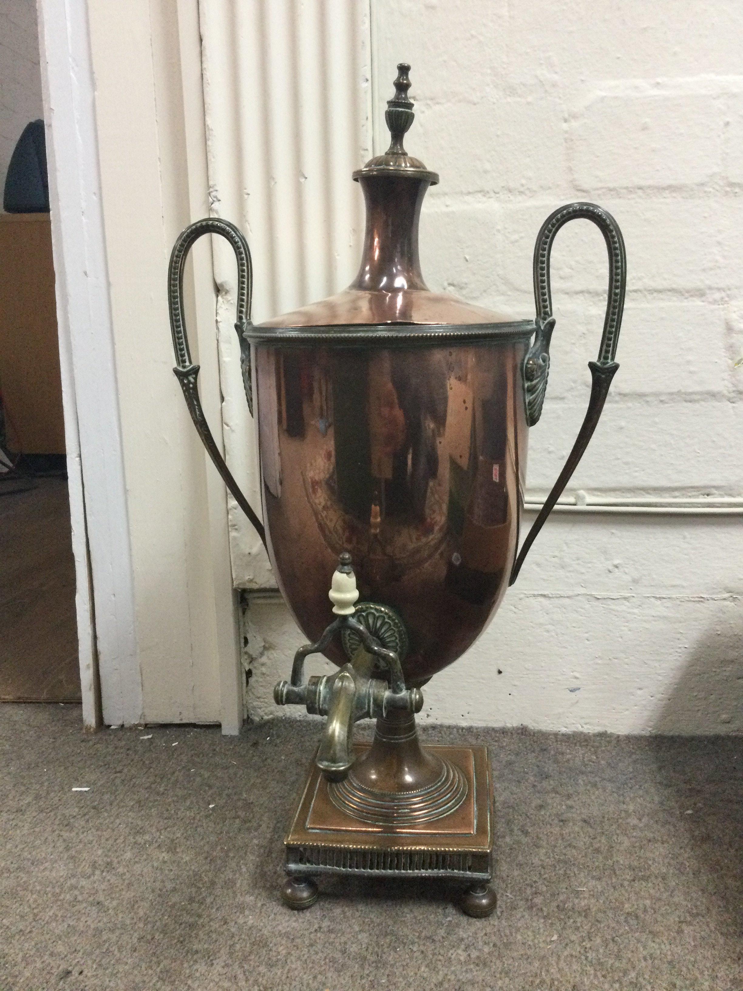 A 19th century brass samovar . 49cm tall This lot cannot be posted