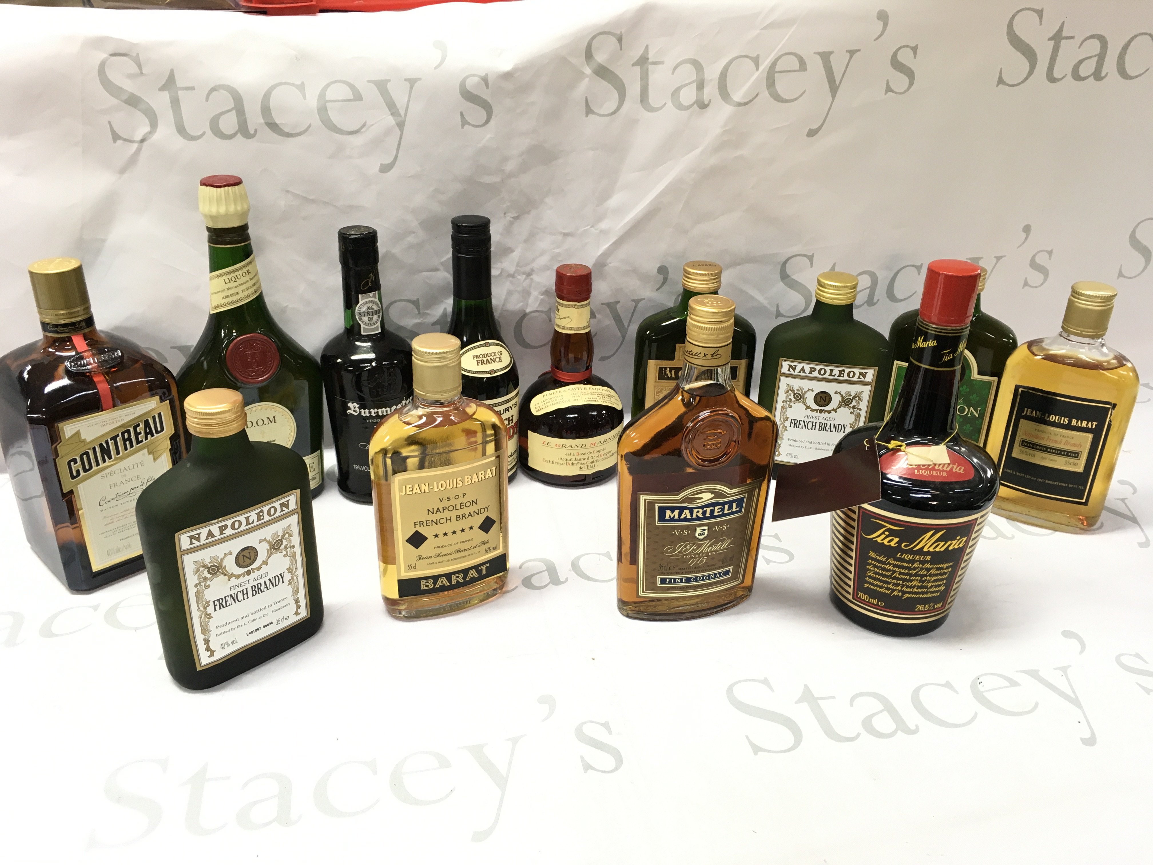 A Collection of spirits including Benedictine, Sainsburys french brandy, Martell VS fine cognac, Tia Maria, Jean Louis Barat Napoleon french brandy etc. this lot cannot be posted