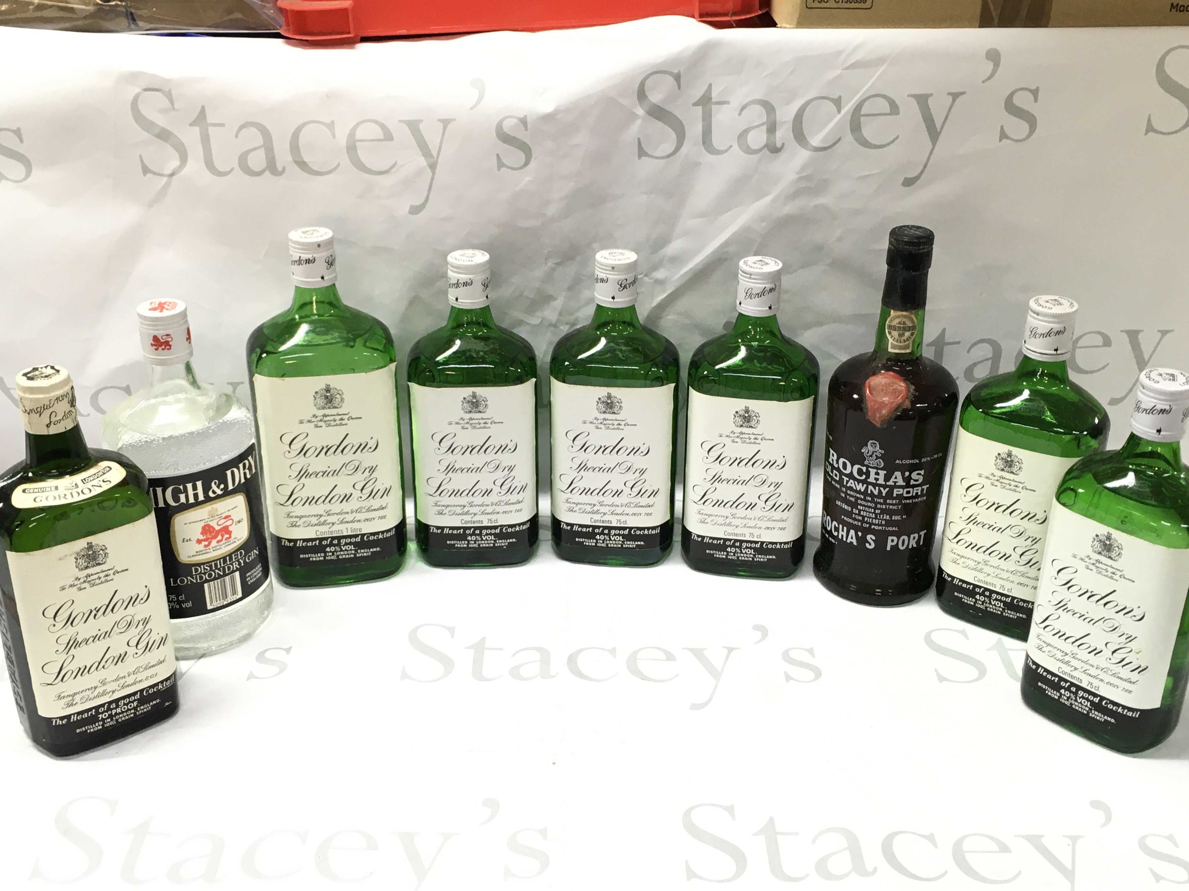 A Collection of Gordons dry gins, High & Dry , Rochas old tawny port . This lot cannot be posted